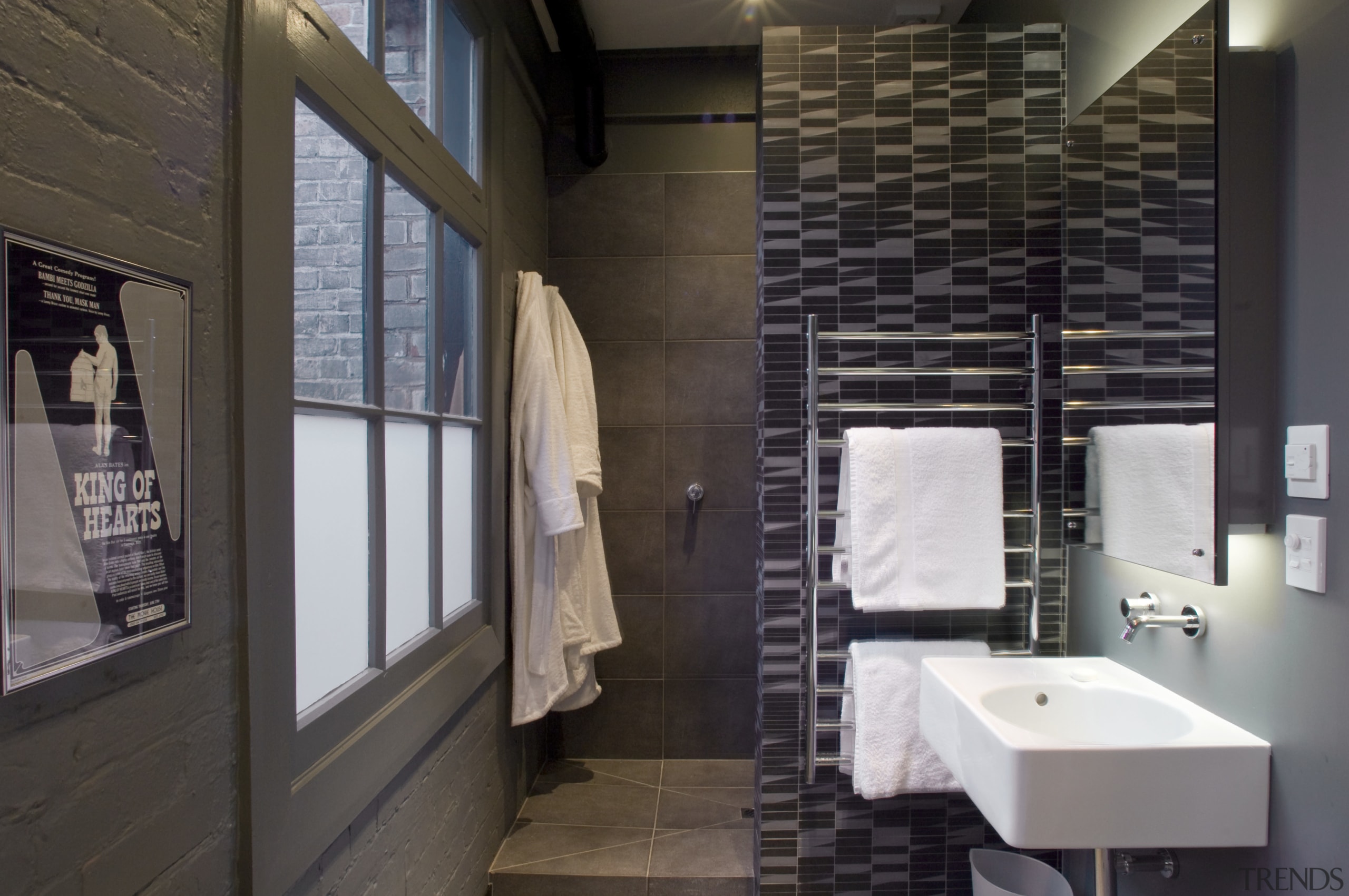 The master bathroom features dark Grey walls and bathroom, floor, interior design, room, black, gray
