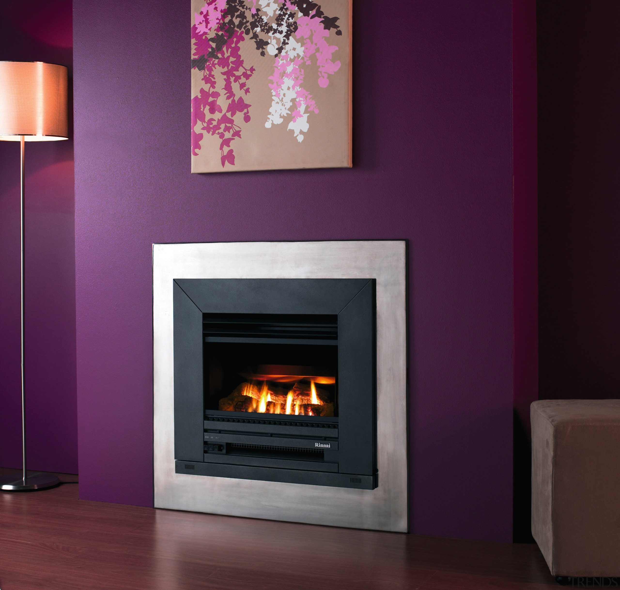 A view of a inbuilt fireplace with steel fireplace, hearth, heat, home appliance, wood burning stove, purple, black