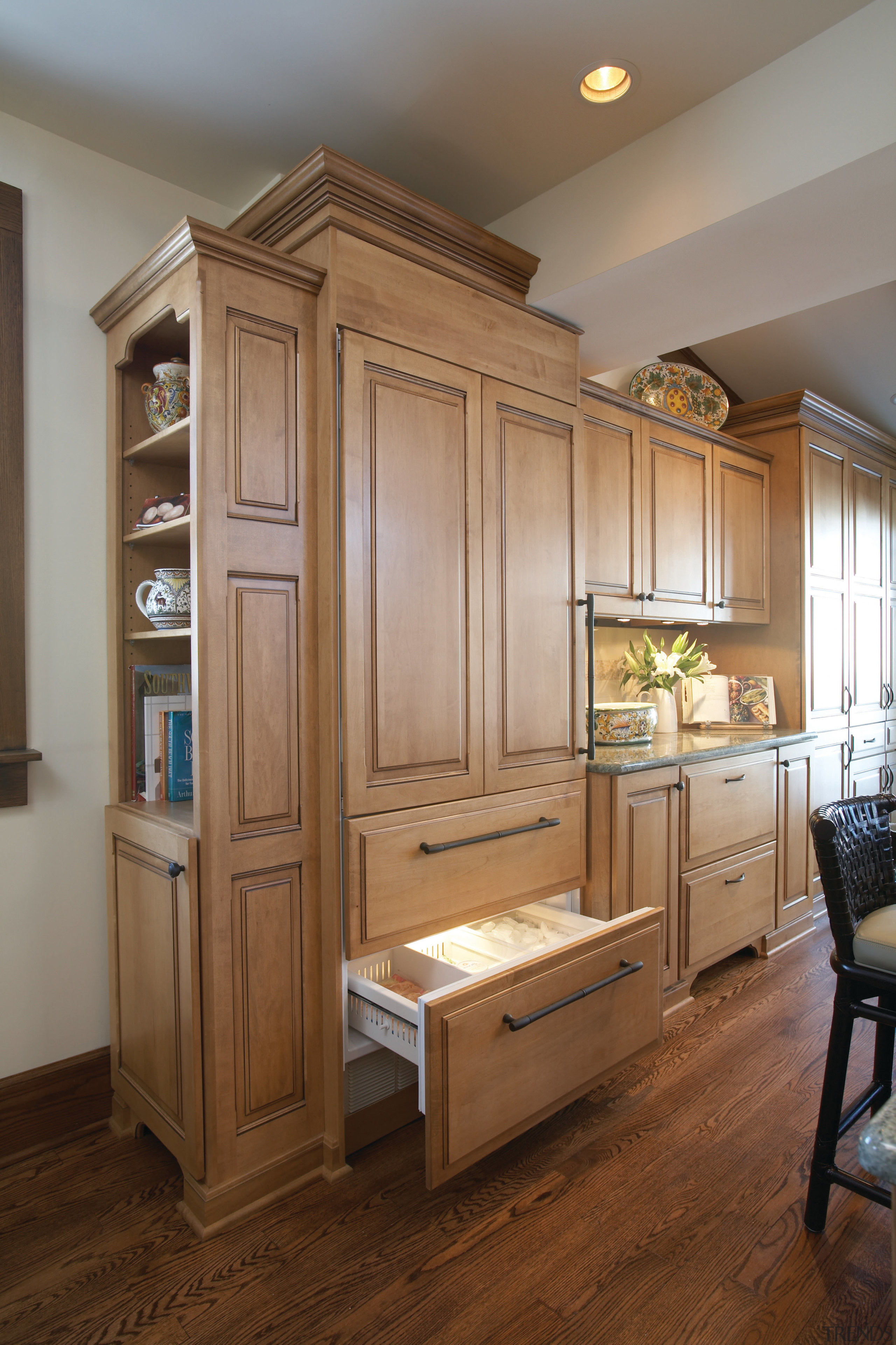 Kitchens traditional ambiance, a Sub Zero refrigerator behind cabinetry, countertop, cuisine classique, flooring, furniture, hardwood, home, interior design, kitchen, room, wood, brown, gray