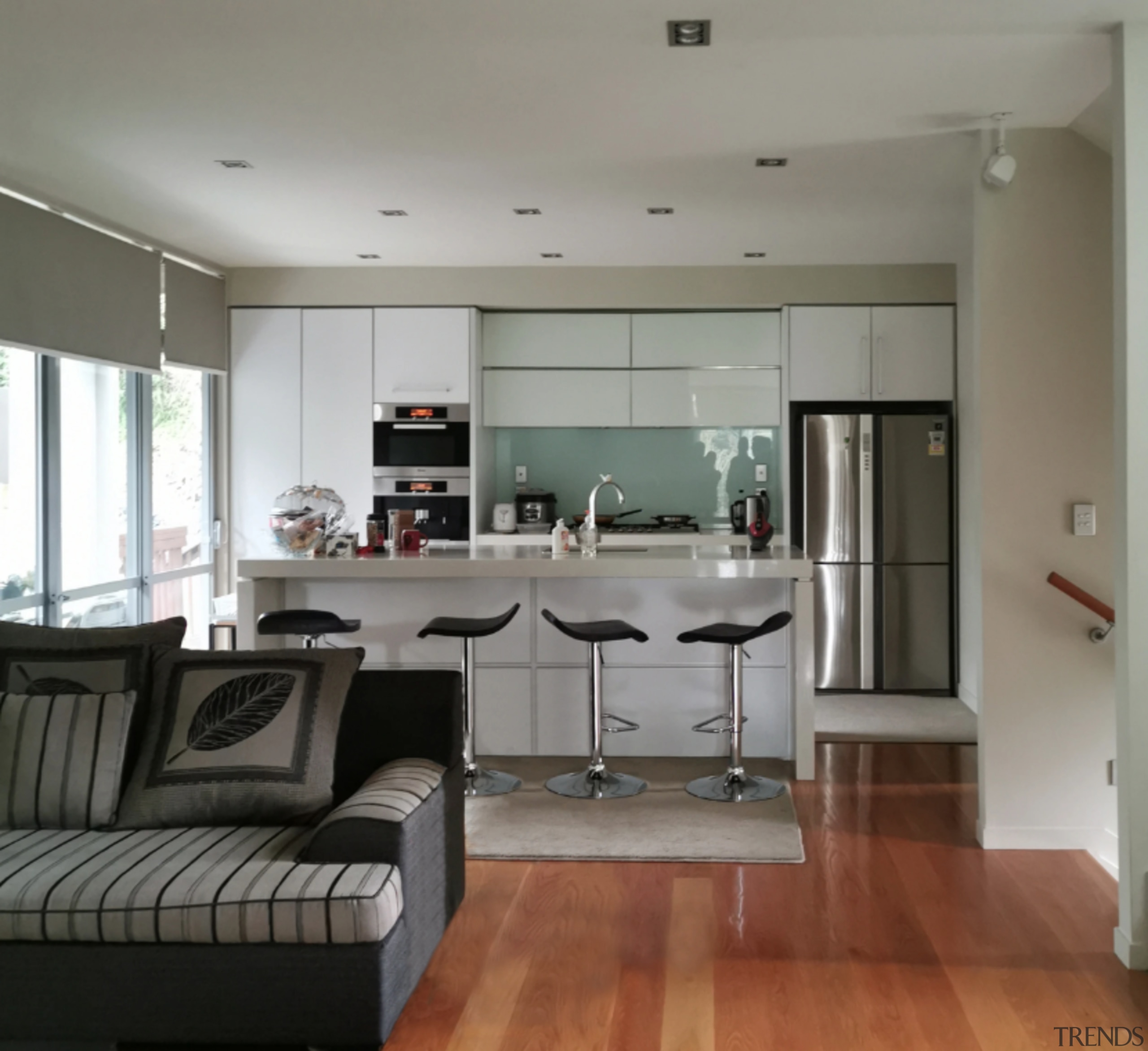 Screen Shot 2019 10 02 at 2 53 apartment, architecture, building, cabinetry, ceiling, coffee table, couch, floor, flooring, furniture, hardwood, home, house, interior design, laminate flooring, living room, loft, property, real estate, room, table, wood flooring, gray