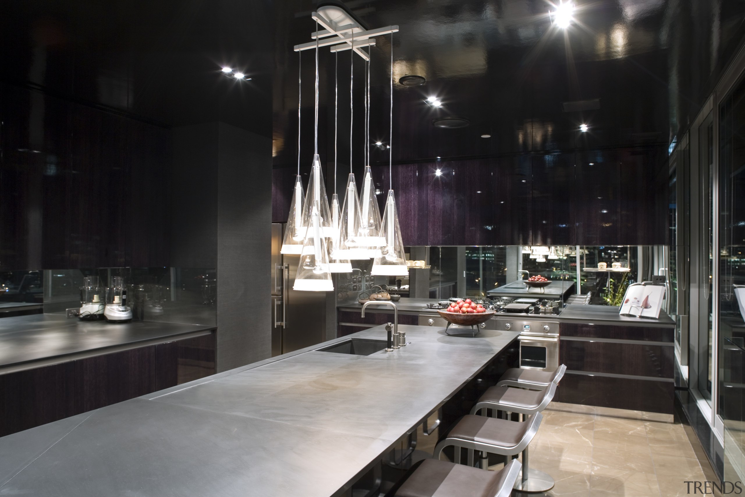 A view of the kitchen featuring stainless steel countertop, interior design, kitchen, black, gray