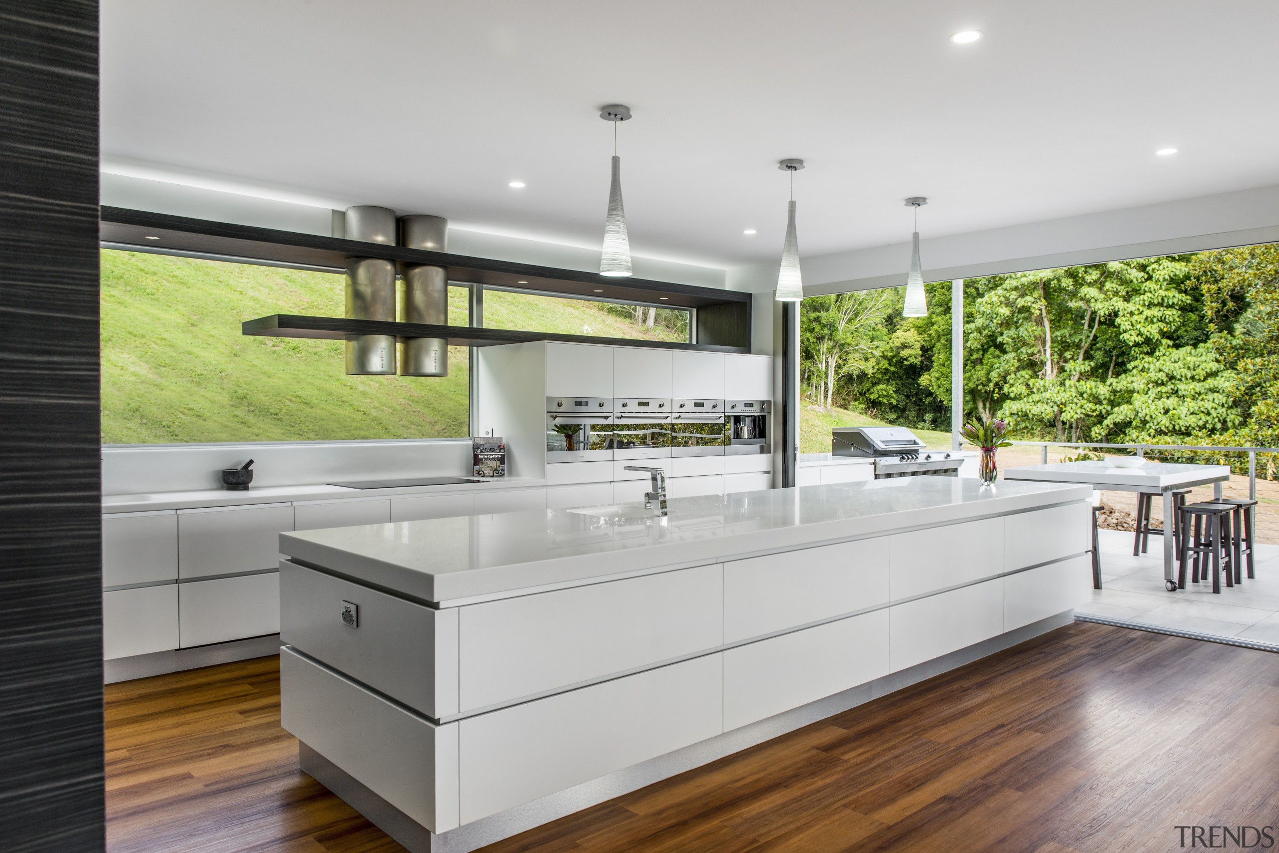 Sleek contemporary kitchen with Smeg appliances - Sleek countertop, interior design, kitchen, real estate, gray