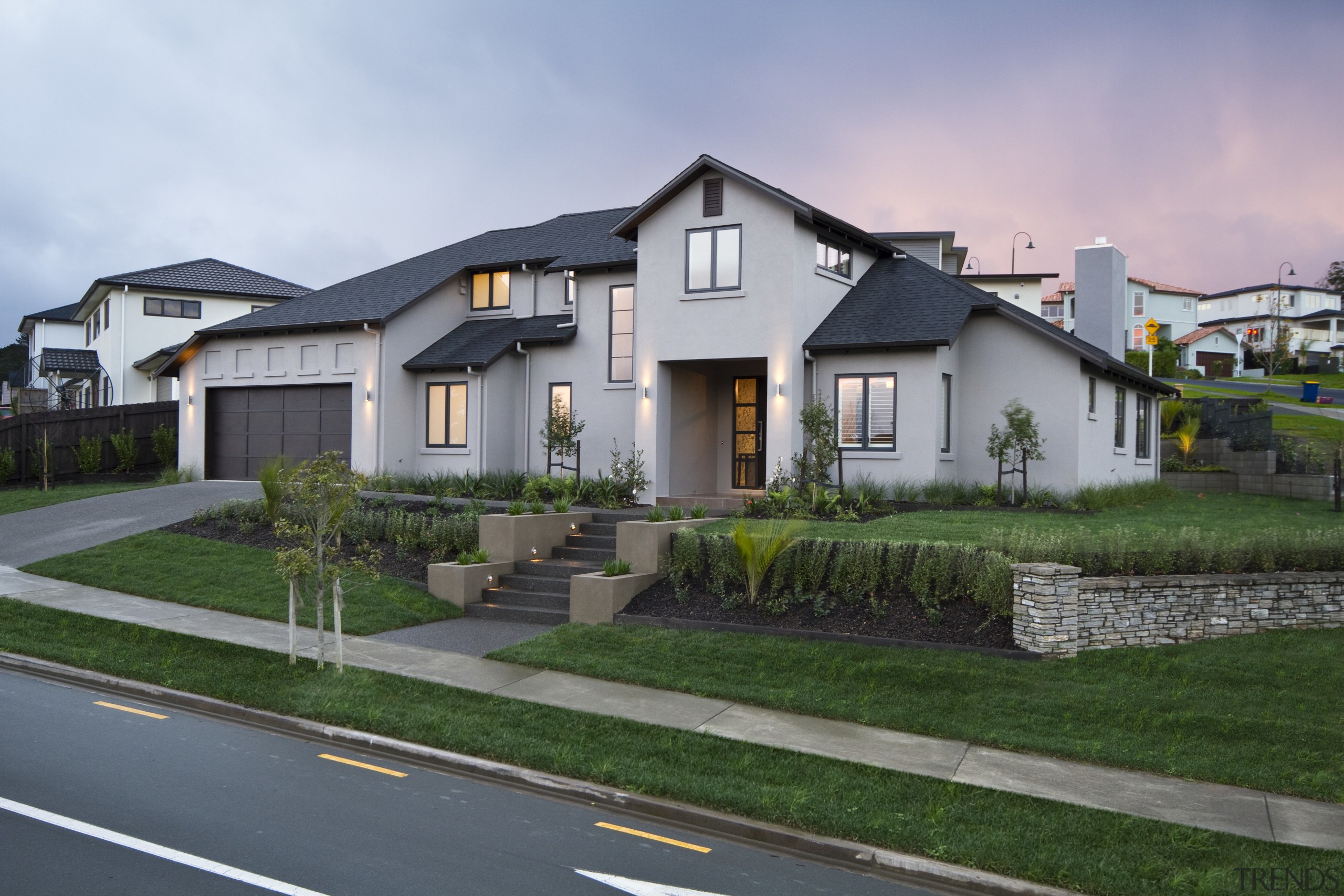 Exterior view of Landmark Homes show home which architecture, building, cottage, elevation, estate, facade, home, house, neighbourhood, property, real estate, residential area, sky, suburb, gray