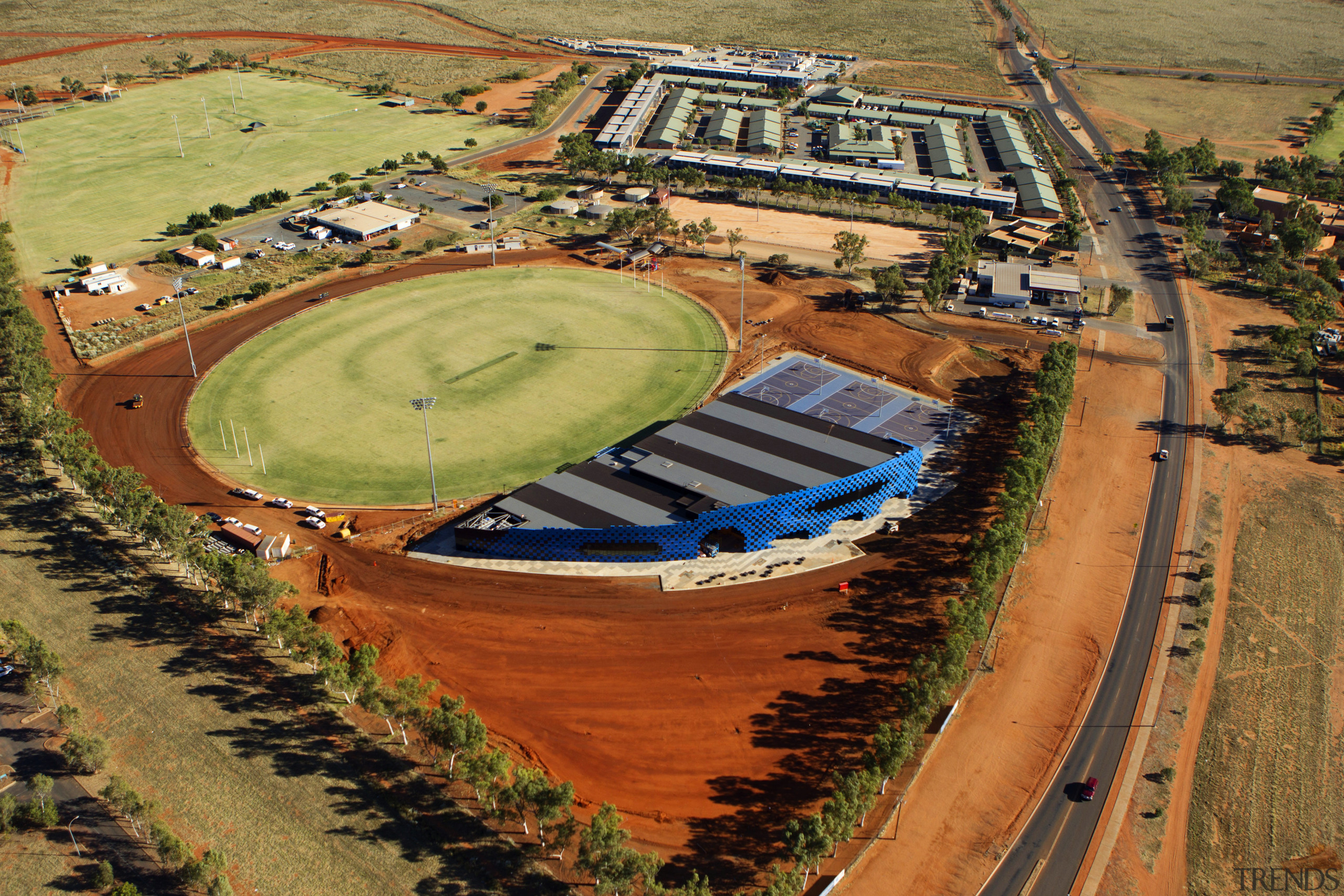 Desert storm  Wanangkura Stadium by ARM Architecture aerial photography, bird's eye view, sport venue, structure, water resources, brown, orange