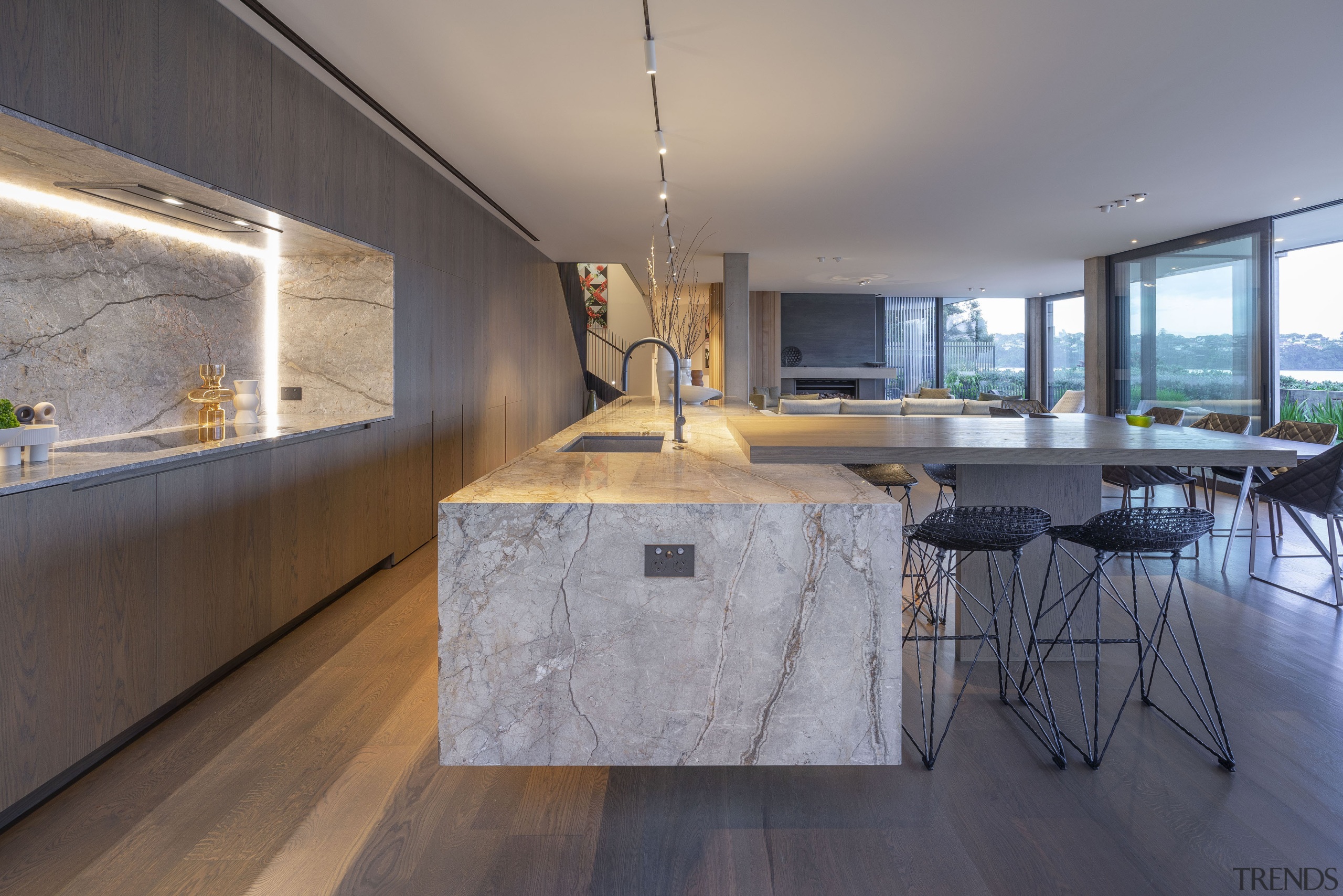 The chunky stone island is cantilevered to sense-of-lightness 