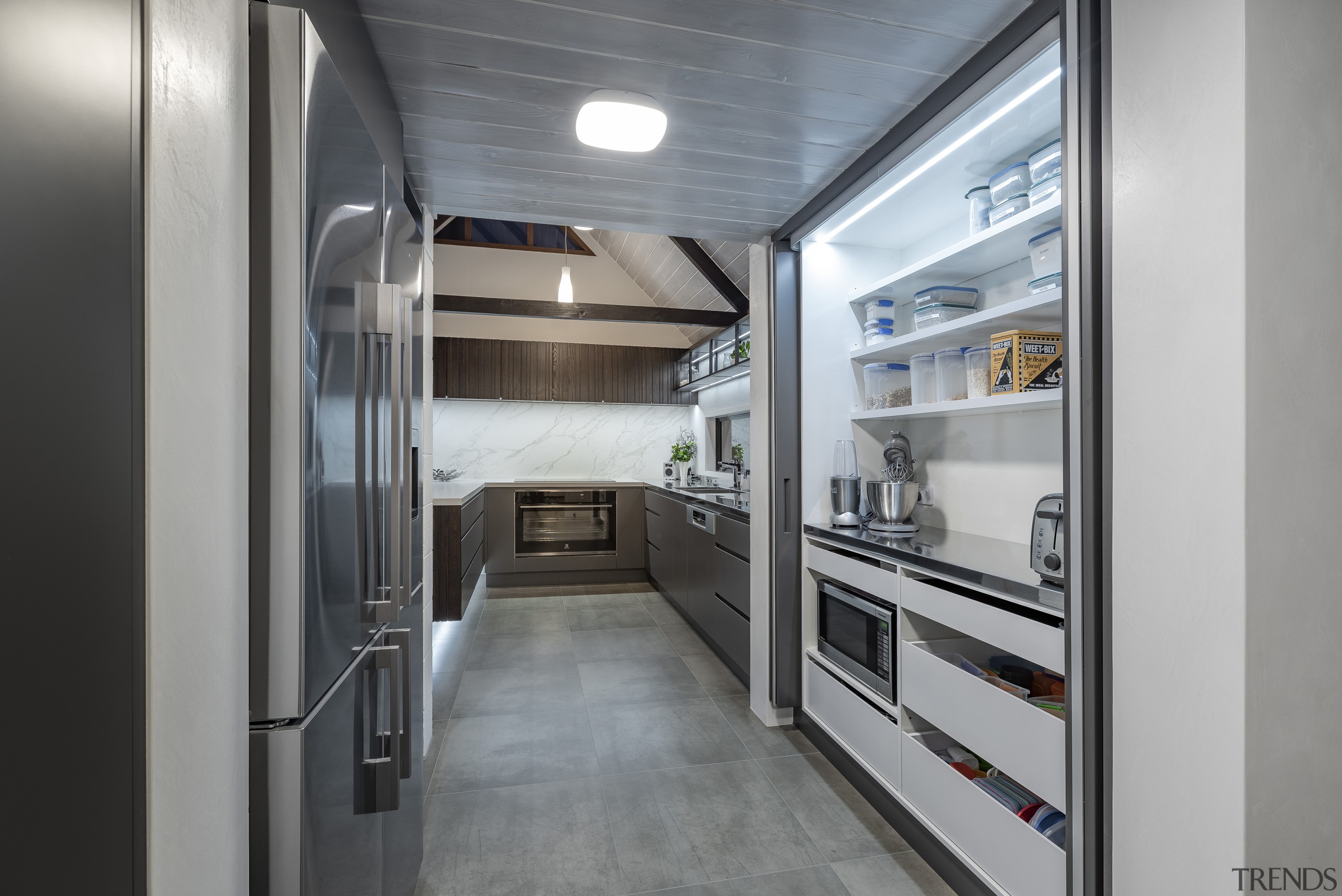 The existing pantry was re-designed with bifold pocket 
