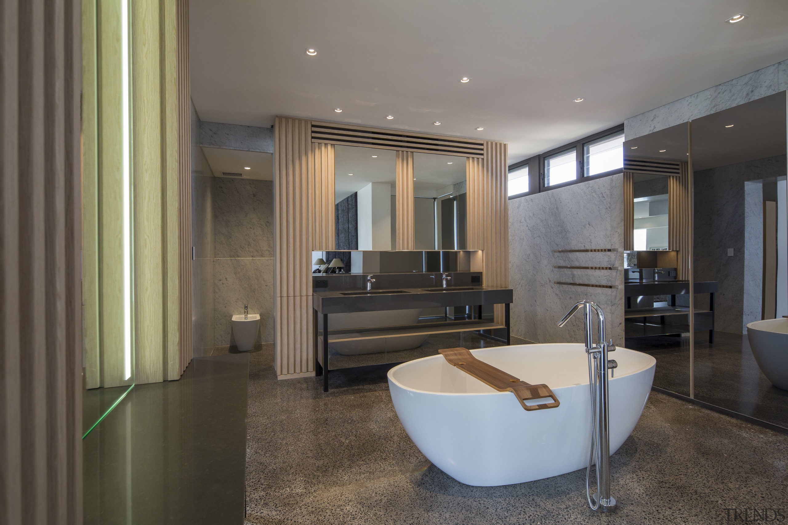 Strong and sculptural  this luxury ensuite by ceiling, floor, flooring, interior design, lobby, real estate, room, gray, black