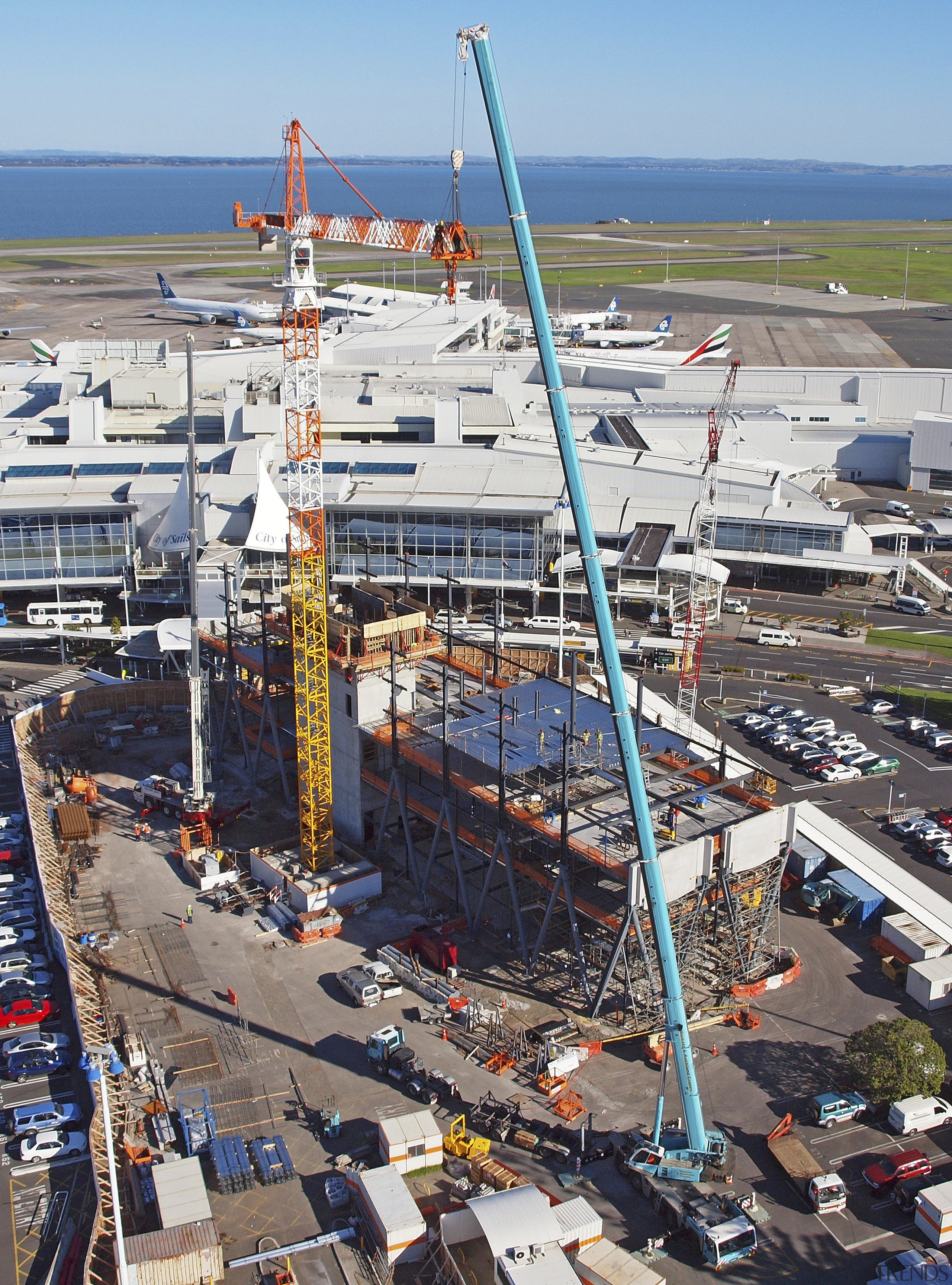 Novotel Auckland Airport by Gorge Grant Engineering. aerial photography, bird's eye view, city, construction, construction equipment, port, sky, urban area