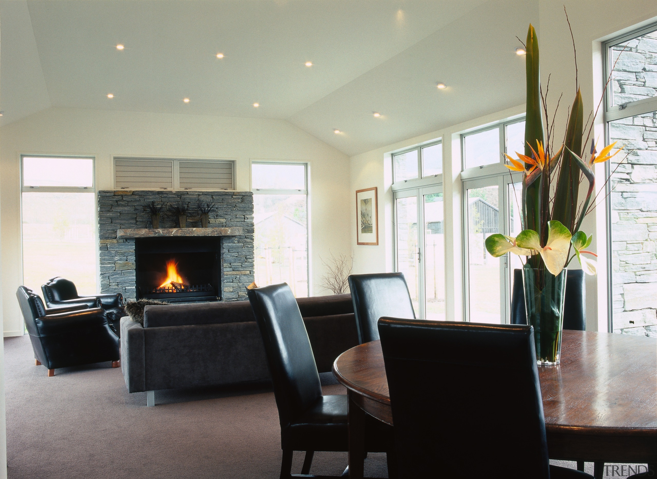 View of dining &amp; living space - View ceiling, dining room, fireplace, floor, flooring, hearth, home, interior design, living room, real estate, room, wall, gray