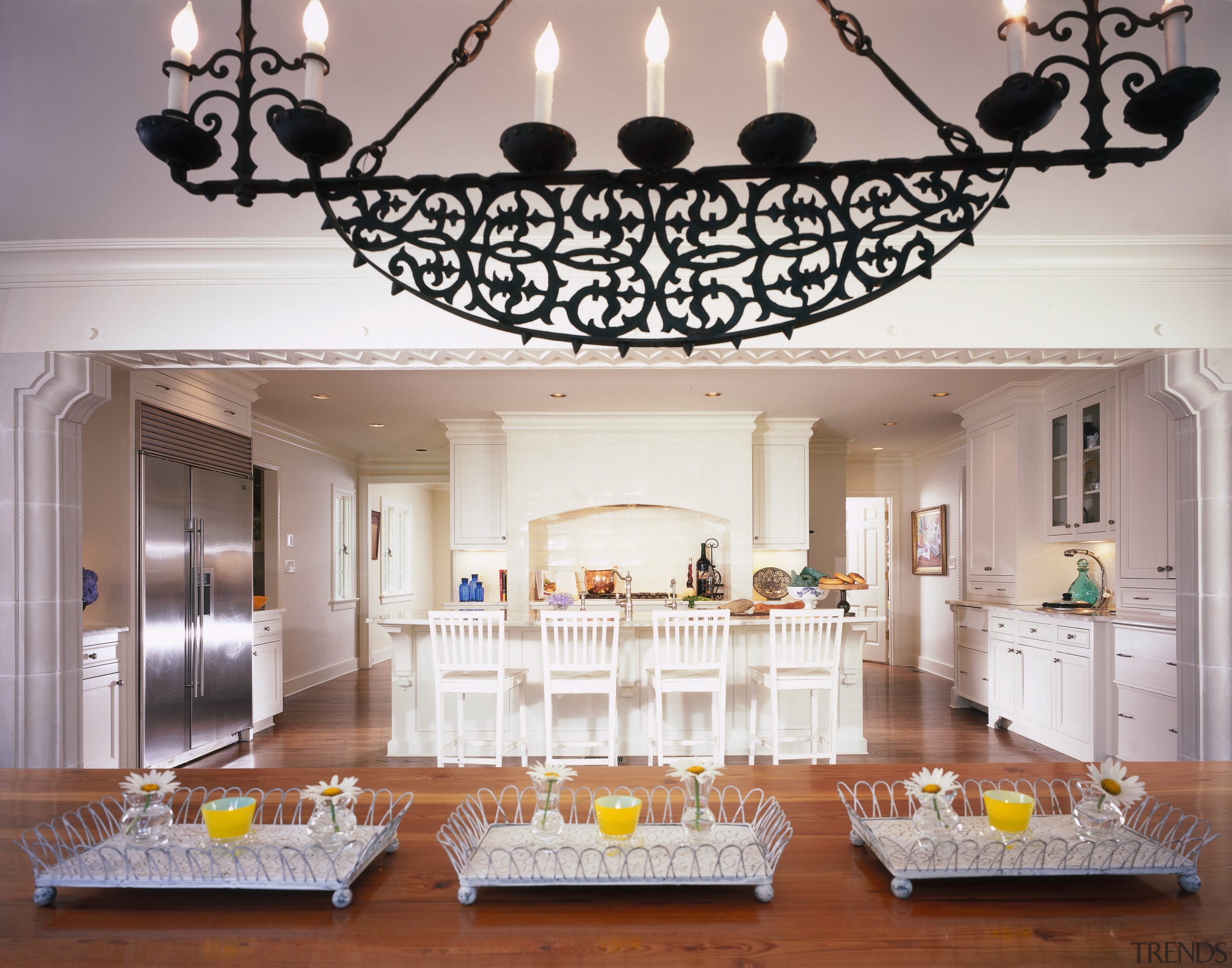 View of white kitchen with timber flooring, and ceiling, dining room, home, interior design, living room, room, table, gray