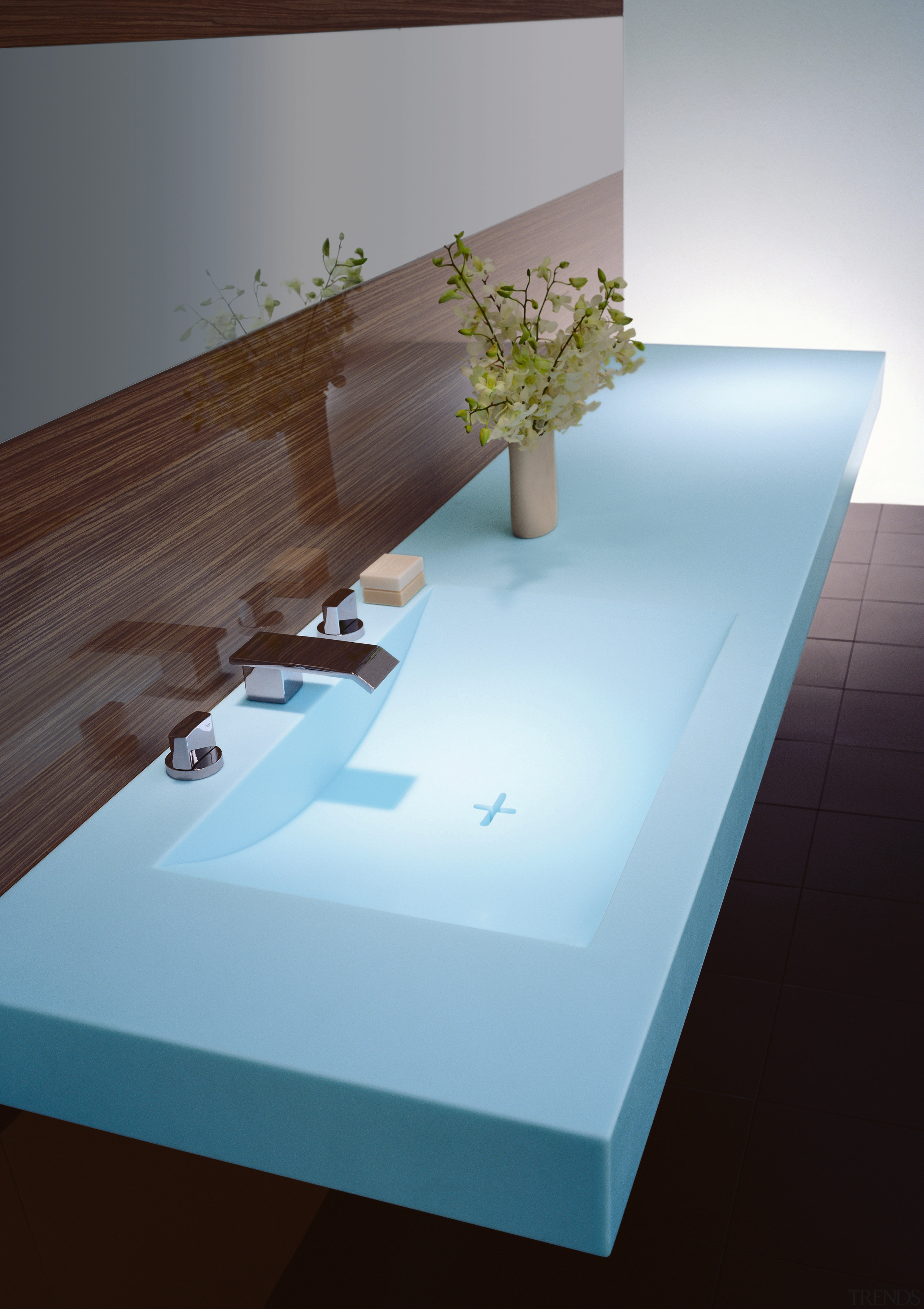 Bathroom with moulded blue basin and vanity, with angle, architecture, daylighting, floor, flooring, furniture, interior design, product design, sink, table, wood, black, gray