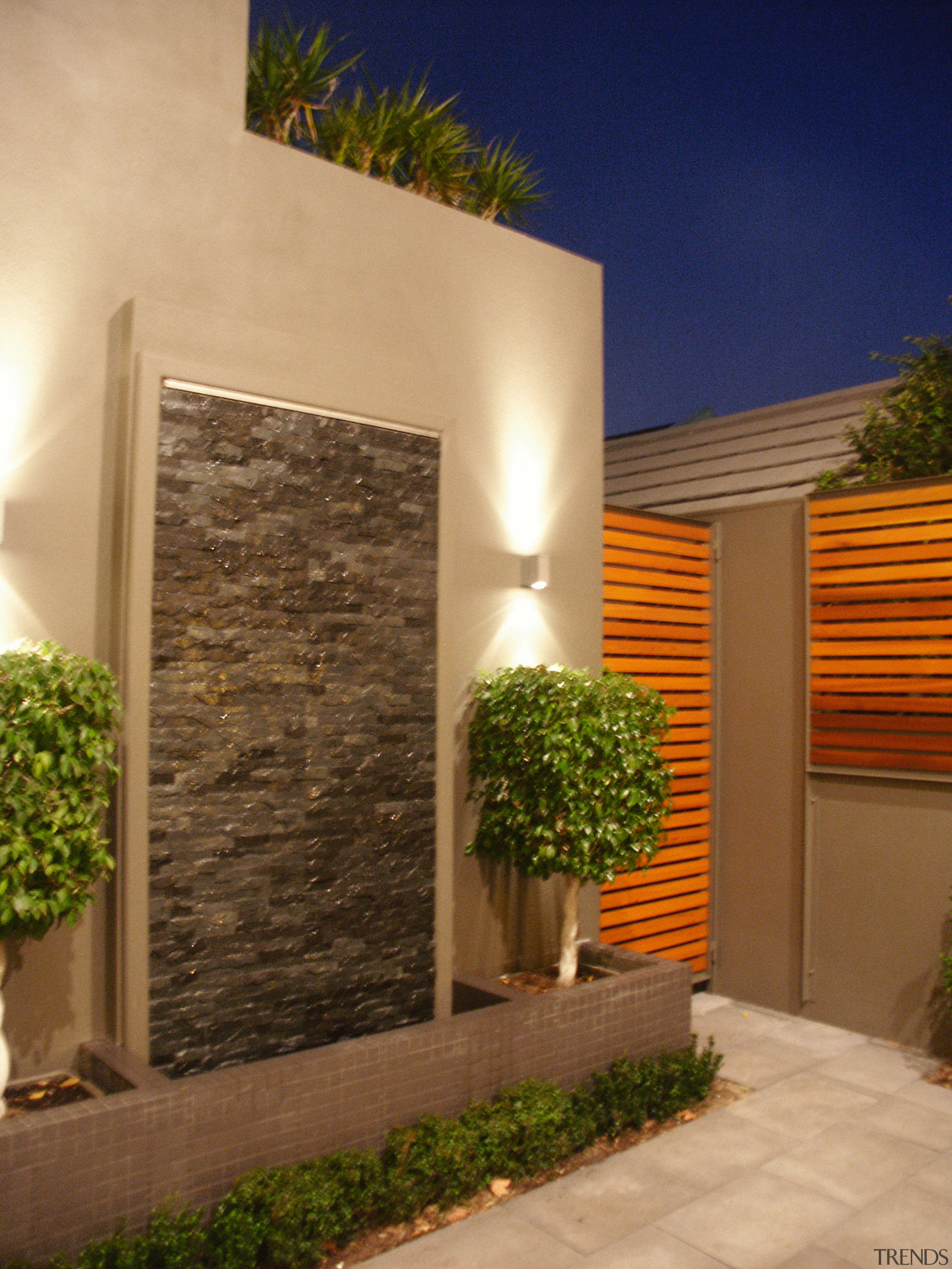 Courtyard area with feature wall, topiary plants, paving architecture, courtyard, estate, facade, home, house, lighting, property, real estate, siding, wall, window, brown, orange