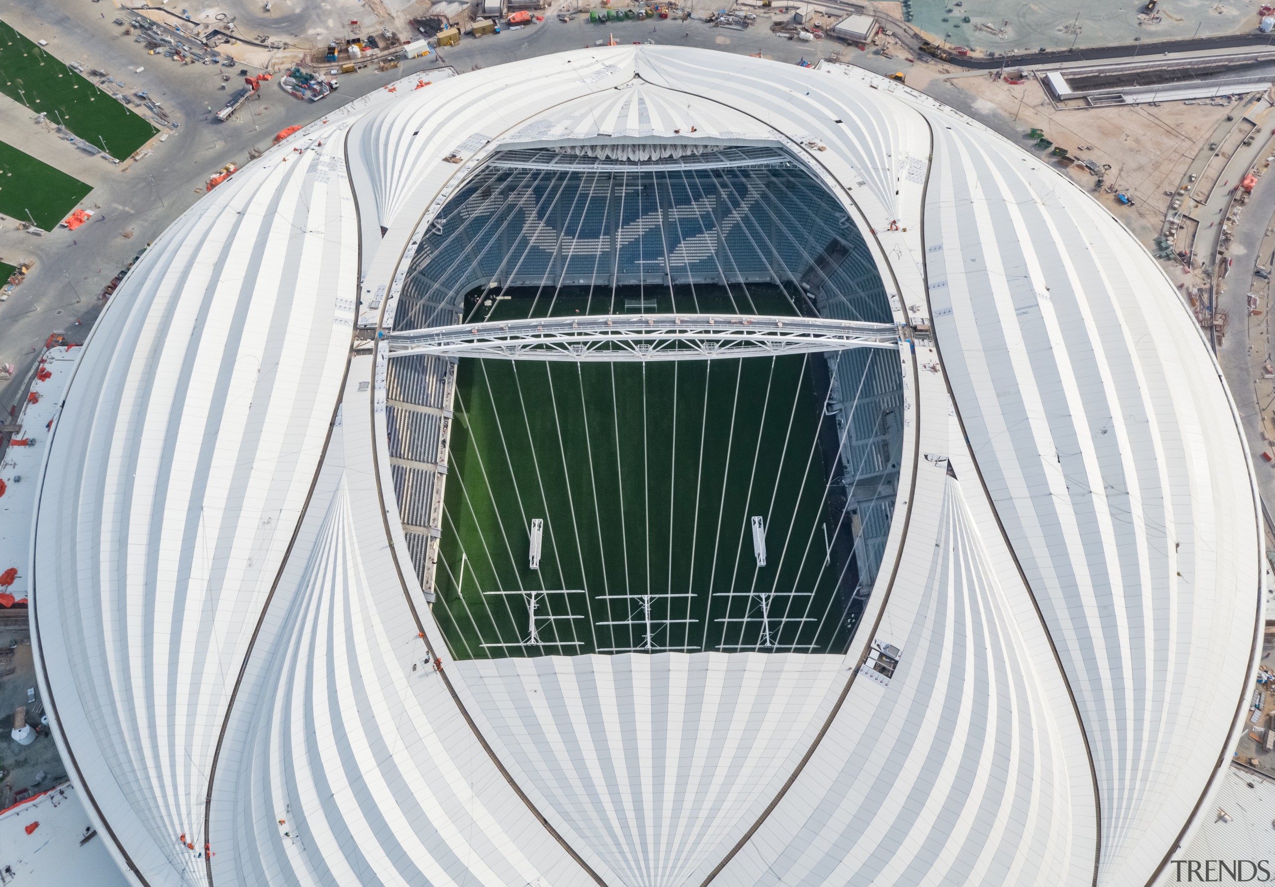 A bird's eye view of the high-tech, high-profile aerospace engineering, daylighting, grass, infrastructure, sport venue, stadium, vehicle, white, gray