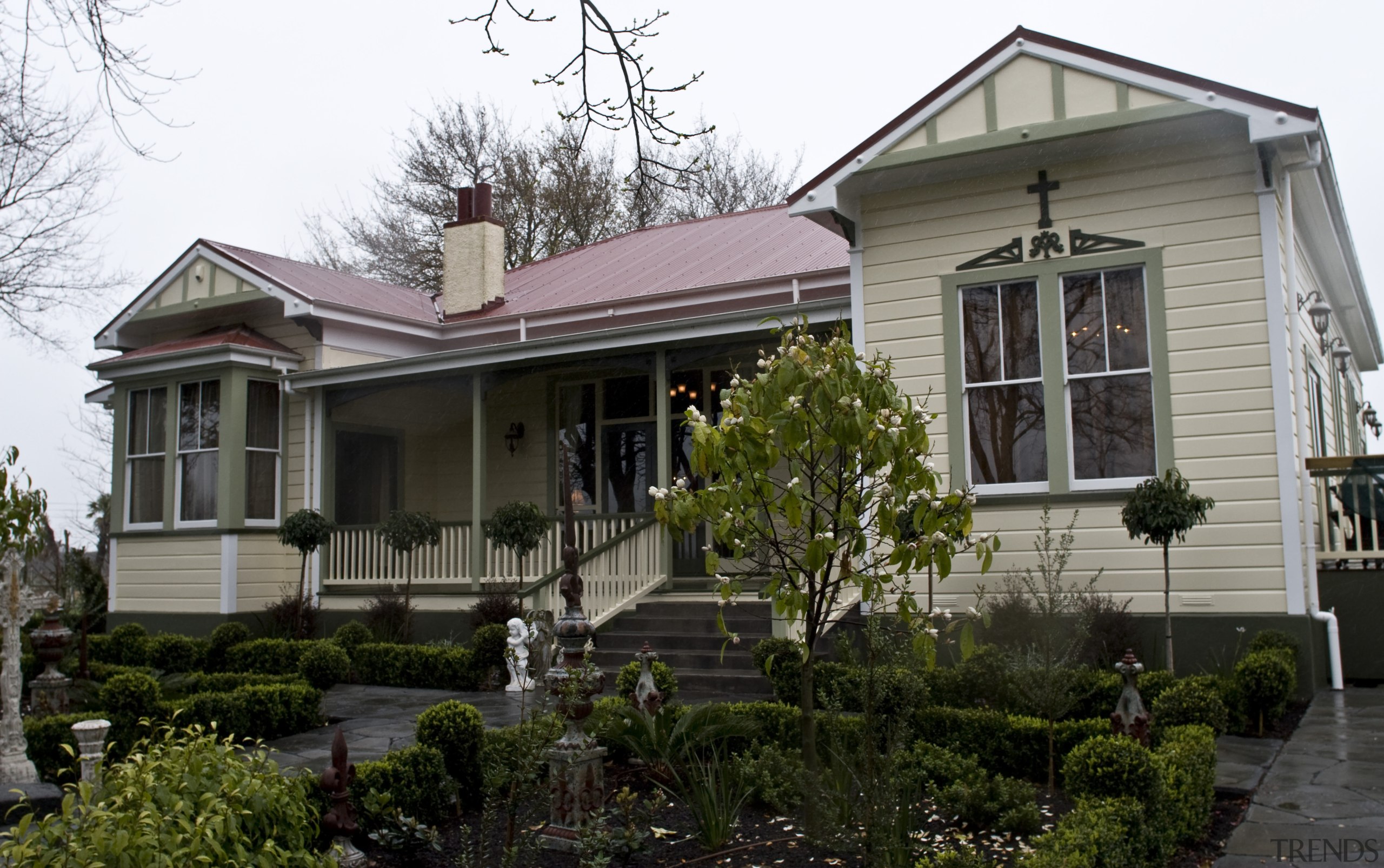 Exterior view of this Victorian presbytery. - Exterior architecture, building, cottage, estate, facade, historic house, home, house, mansion, neighbourhood, porch, property, real estate, residential area, roof, siding, suburb, tree, window, black