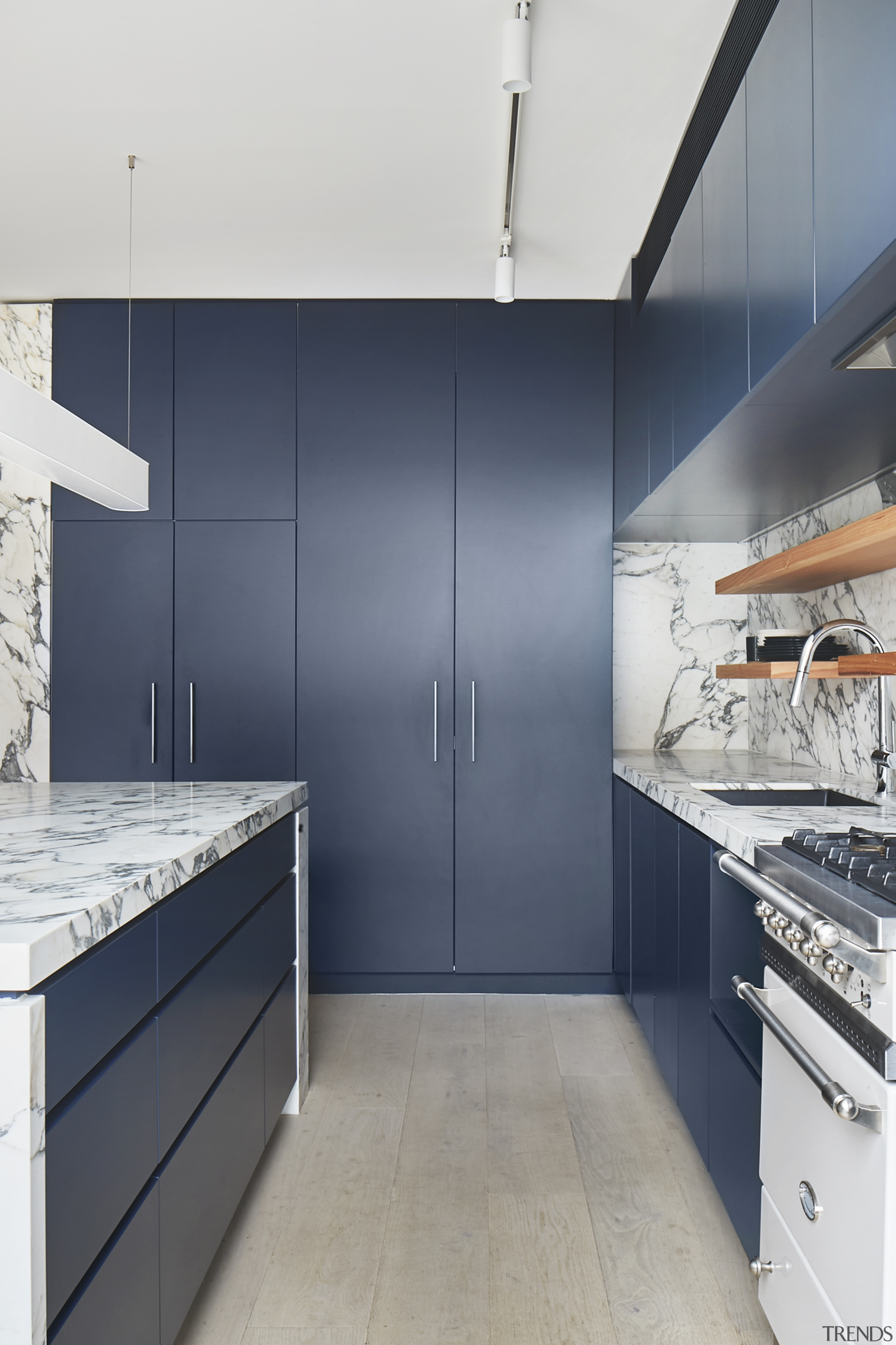 ​​​​​​​In this kitchen, by McMahon and Nerlich, the architecture, cabinetry, countertop, floor, interior design, kitchen, tile, grey cabinetry, marble