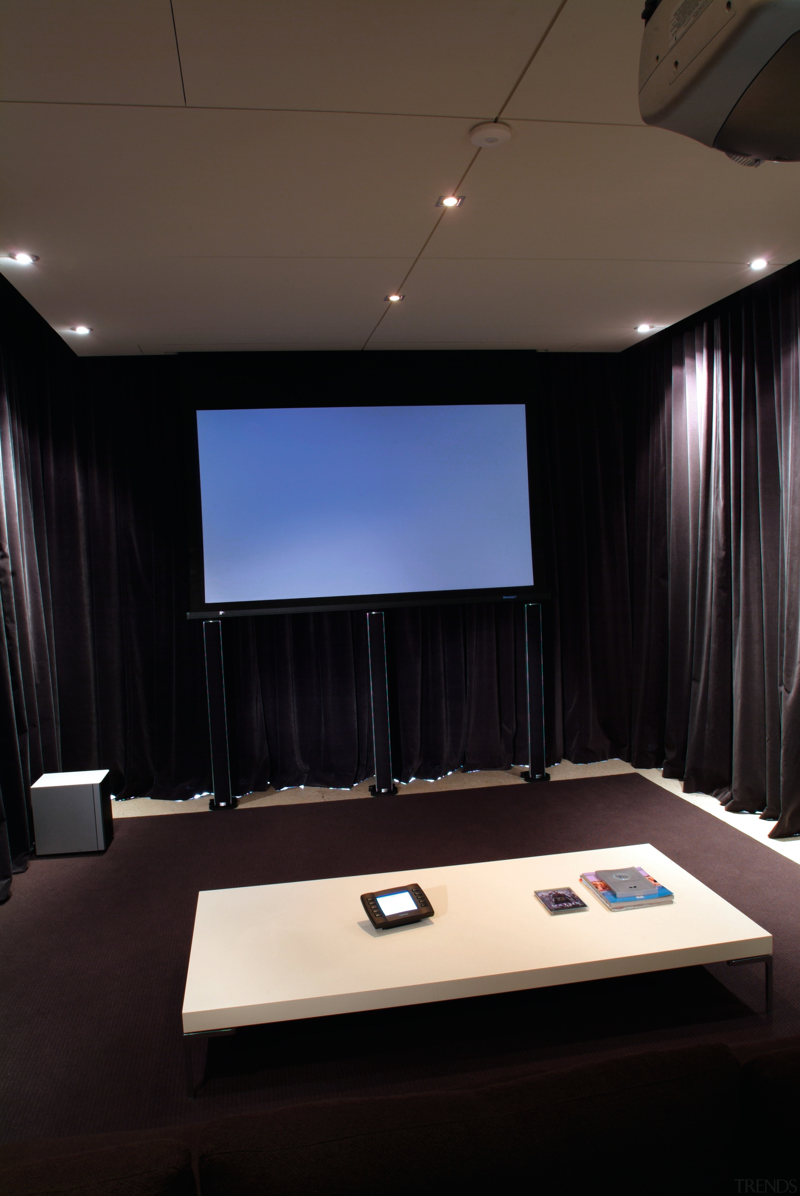 view of the home theatre area with motorised ceiling, interior design, light, light fixture, lighting, recreation room, room, table, black