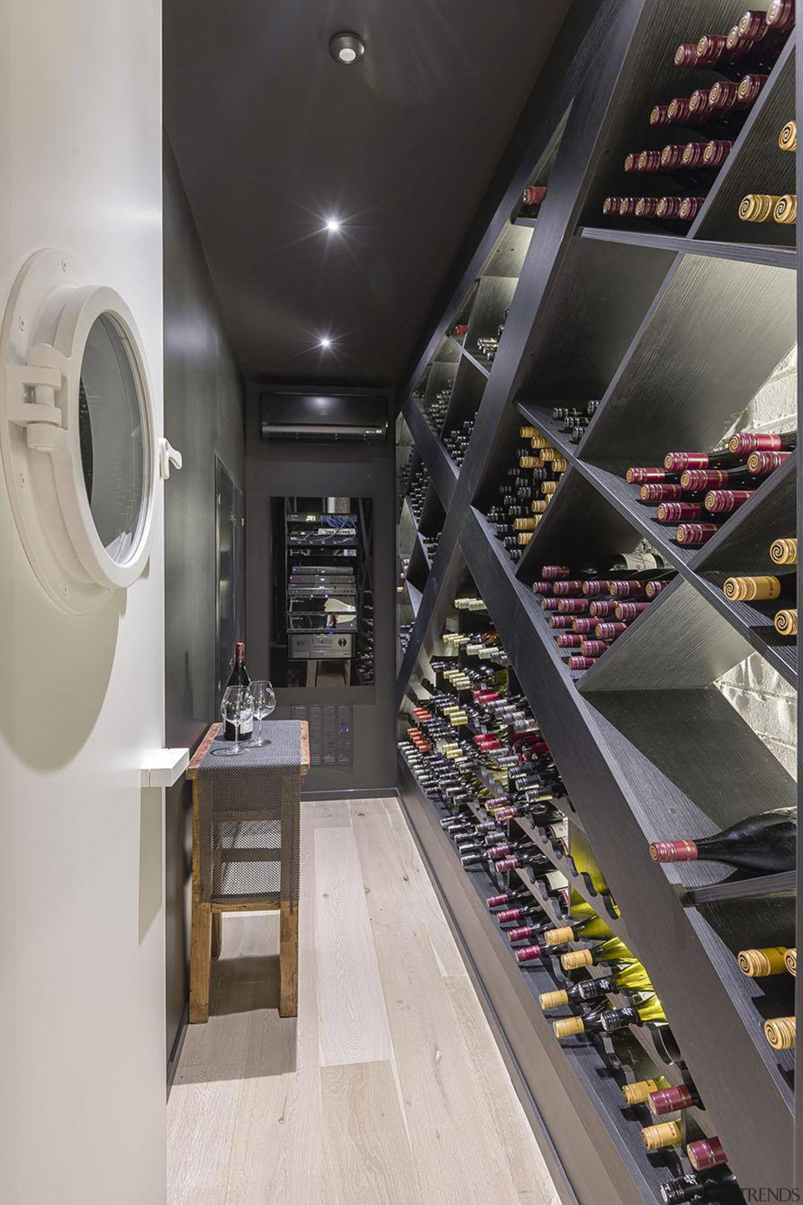 An elegant impressive wine storage area. - Robin interior design, gray, black