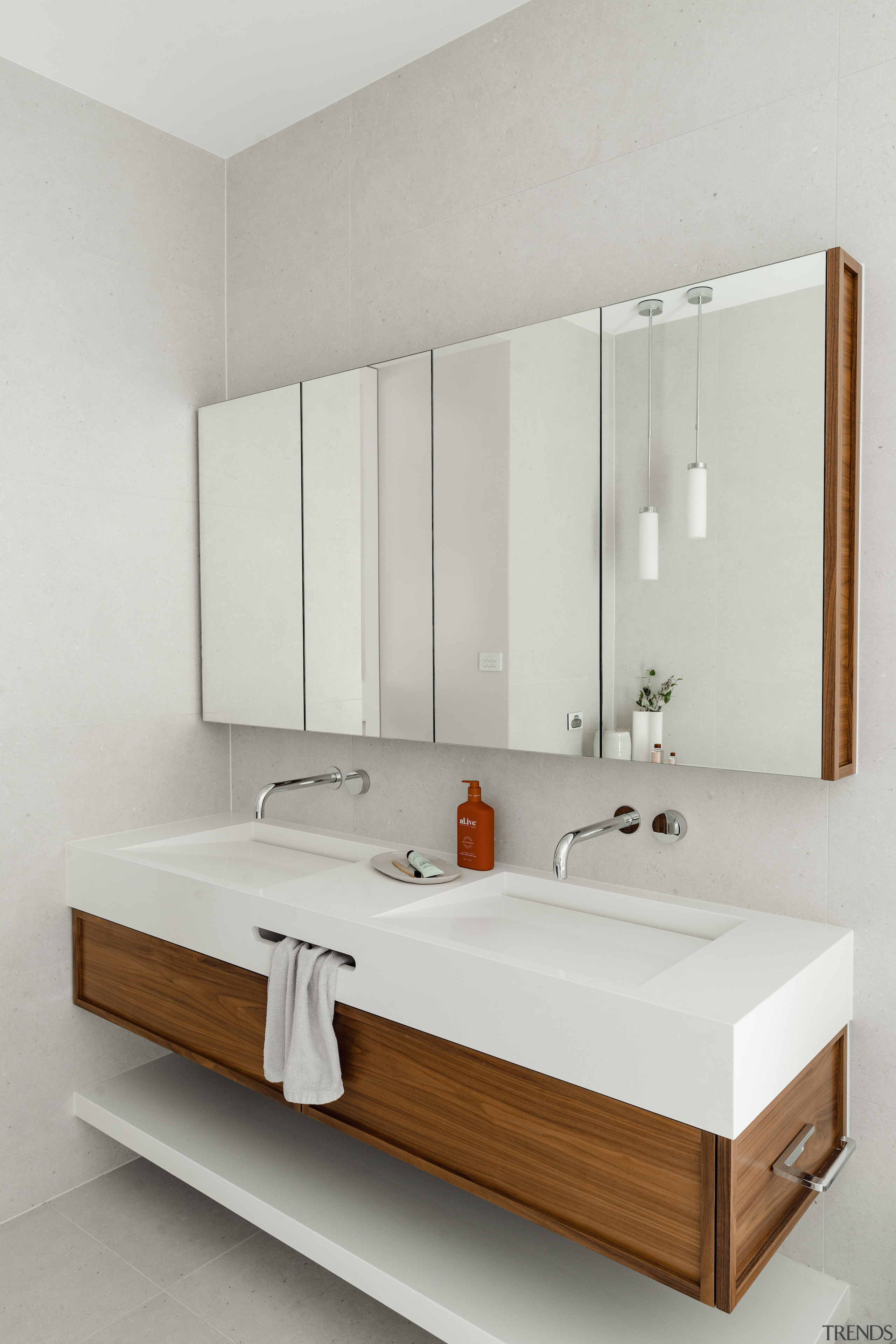 The double vanity in solid American walnut with 