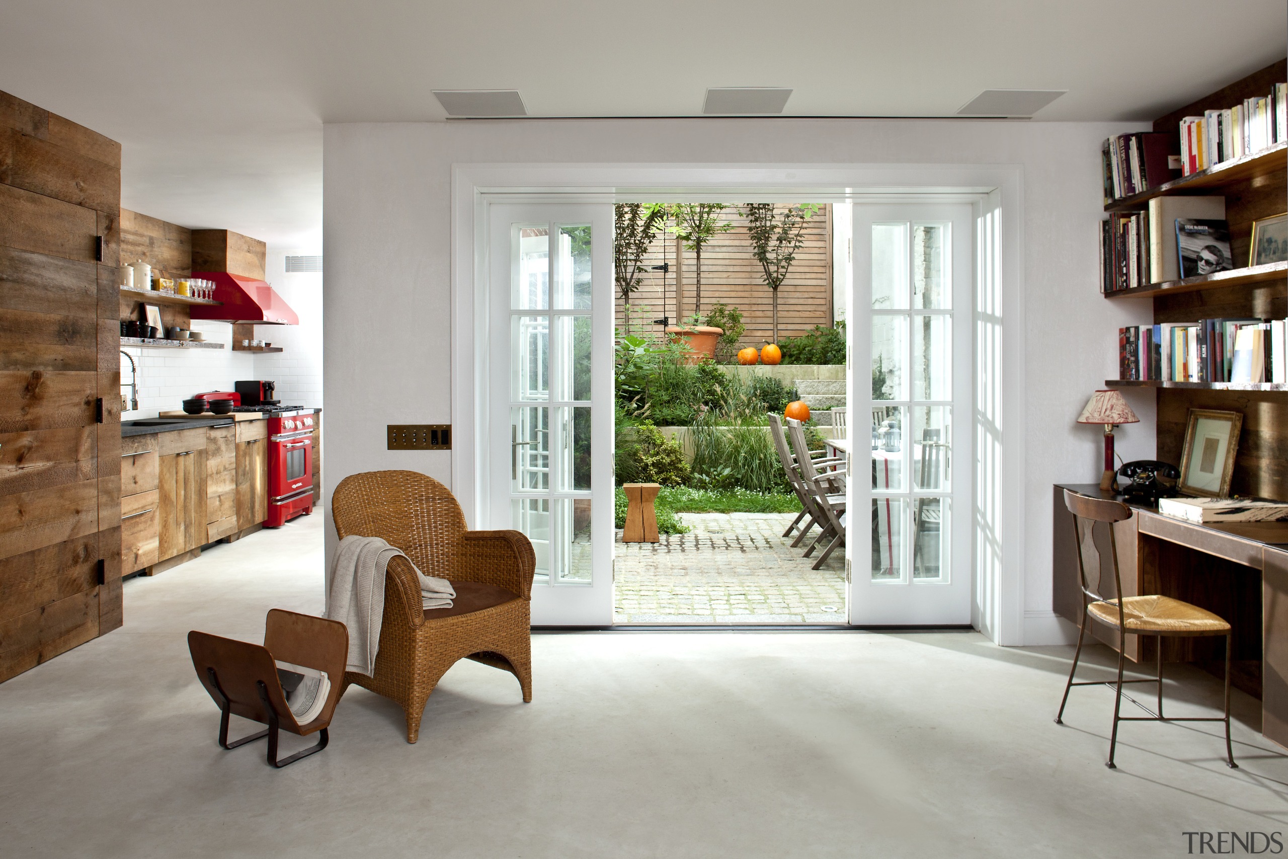 Garden level of Manhattan townhouse remodel - Garden bookcase, furniture, interior design, living room, shelf, shelving, gray