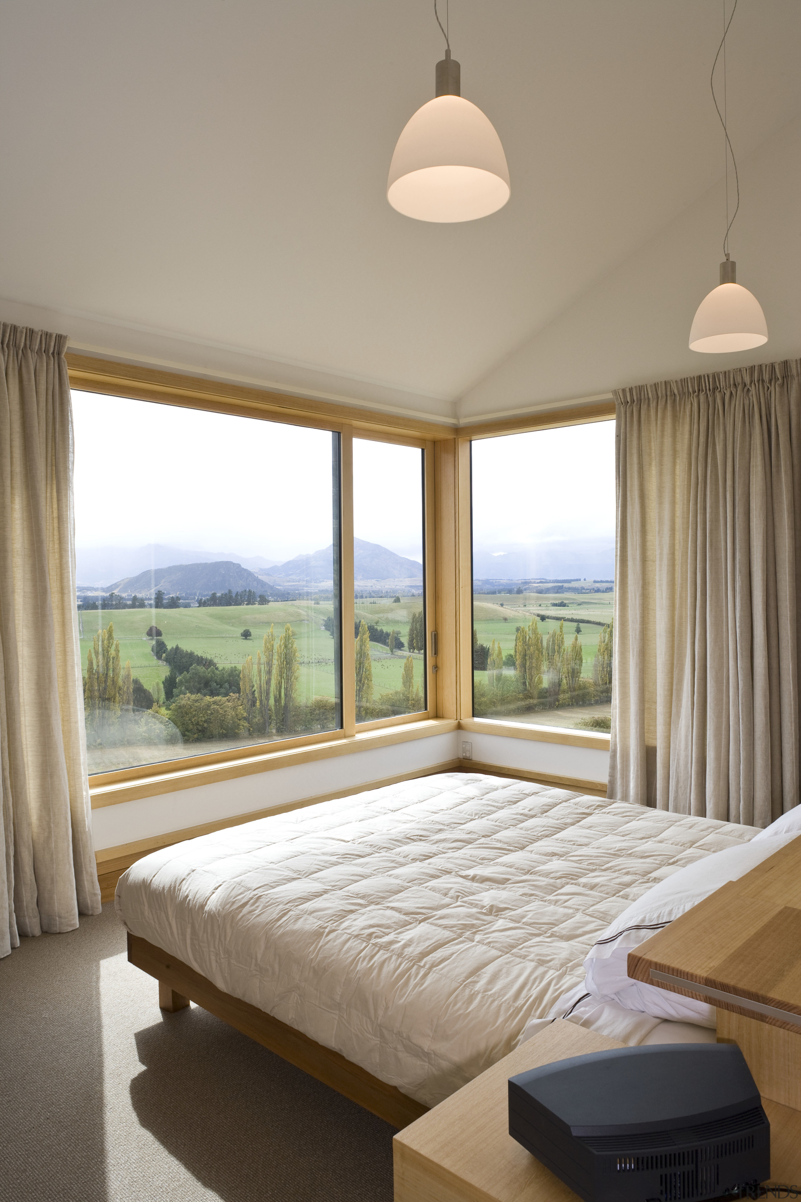 View of master bedroom with large windows, bed, bed frame, bedroom, ceiling, daylighting, estate, floor, home, interior design, mattress, property, real estate, room, window, window treatment, wood, gray, brown