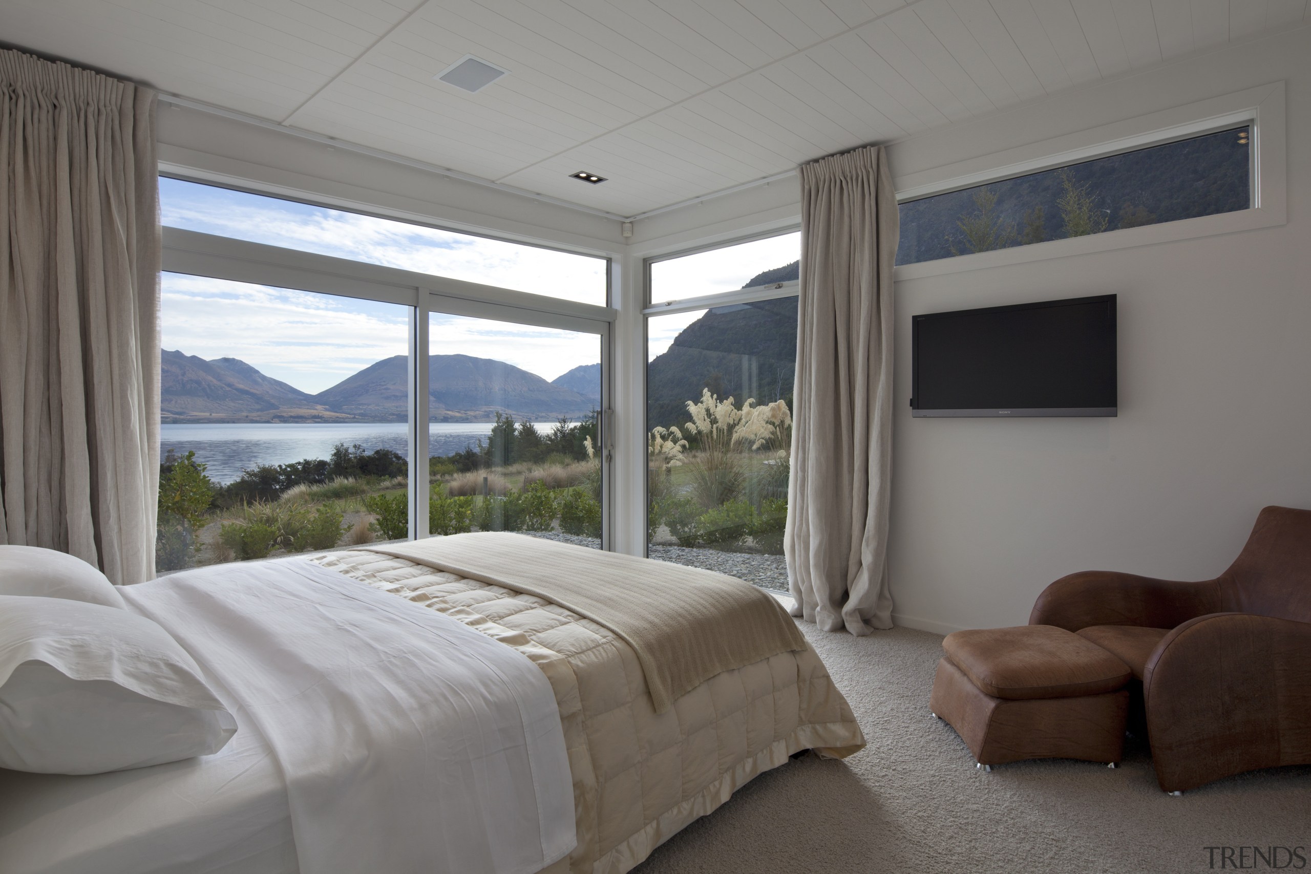 Bedroom in transparent contemporary new home optimises views bedroom, ceiling, estate, home, interior design, property, real estate, room, window, window covering, window treatment, gray