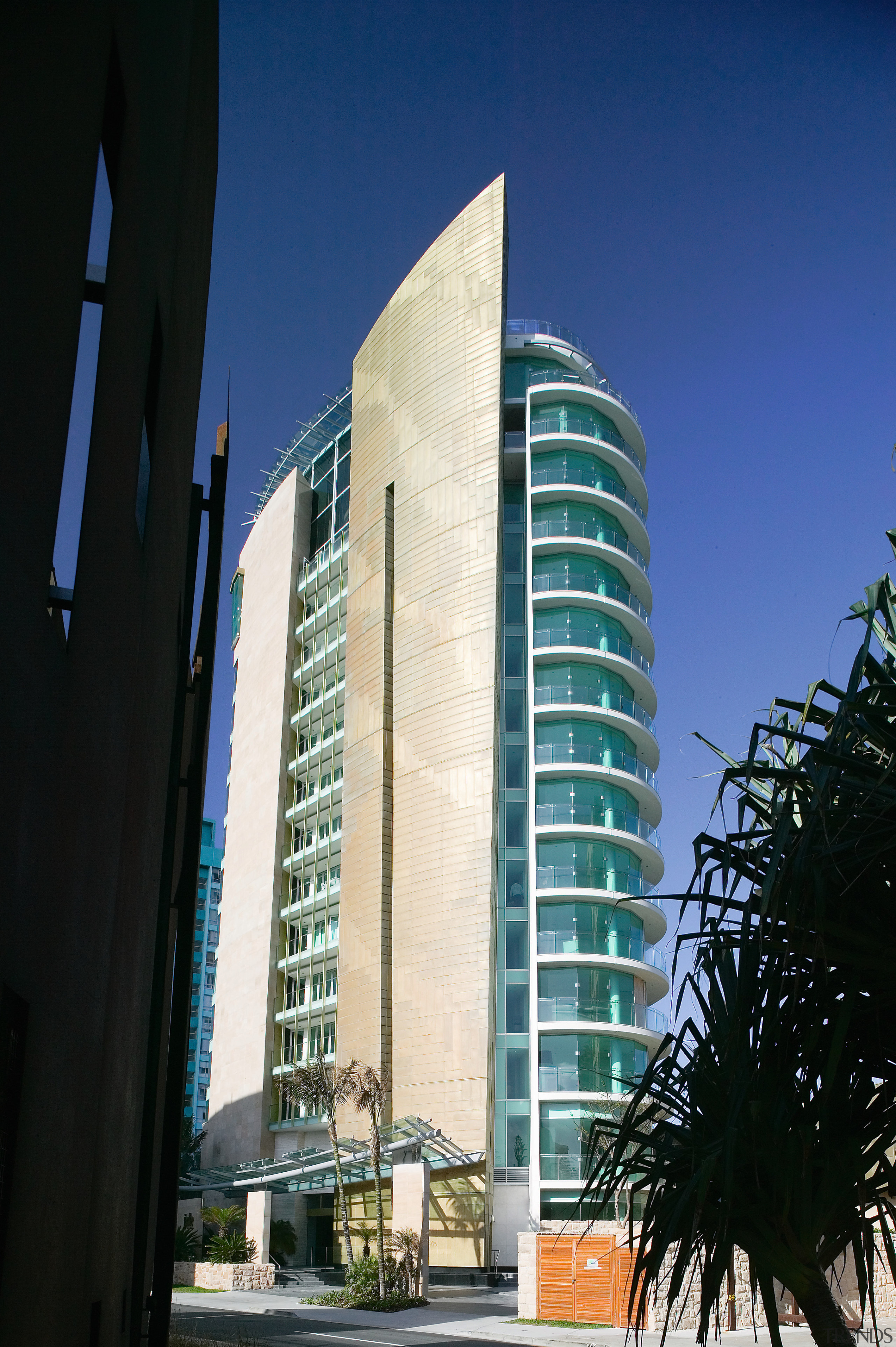 An exterior view of the Jade apartment tower apartment, architecture, building, city, commercial building, condominium, corporate headquarters, daytime, downtown, facade, headquarters, hotel, metropolis, metropolitan area, mixed use, real estate, sky, skyscraper, tower, tower block, urban area, black, blue