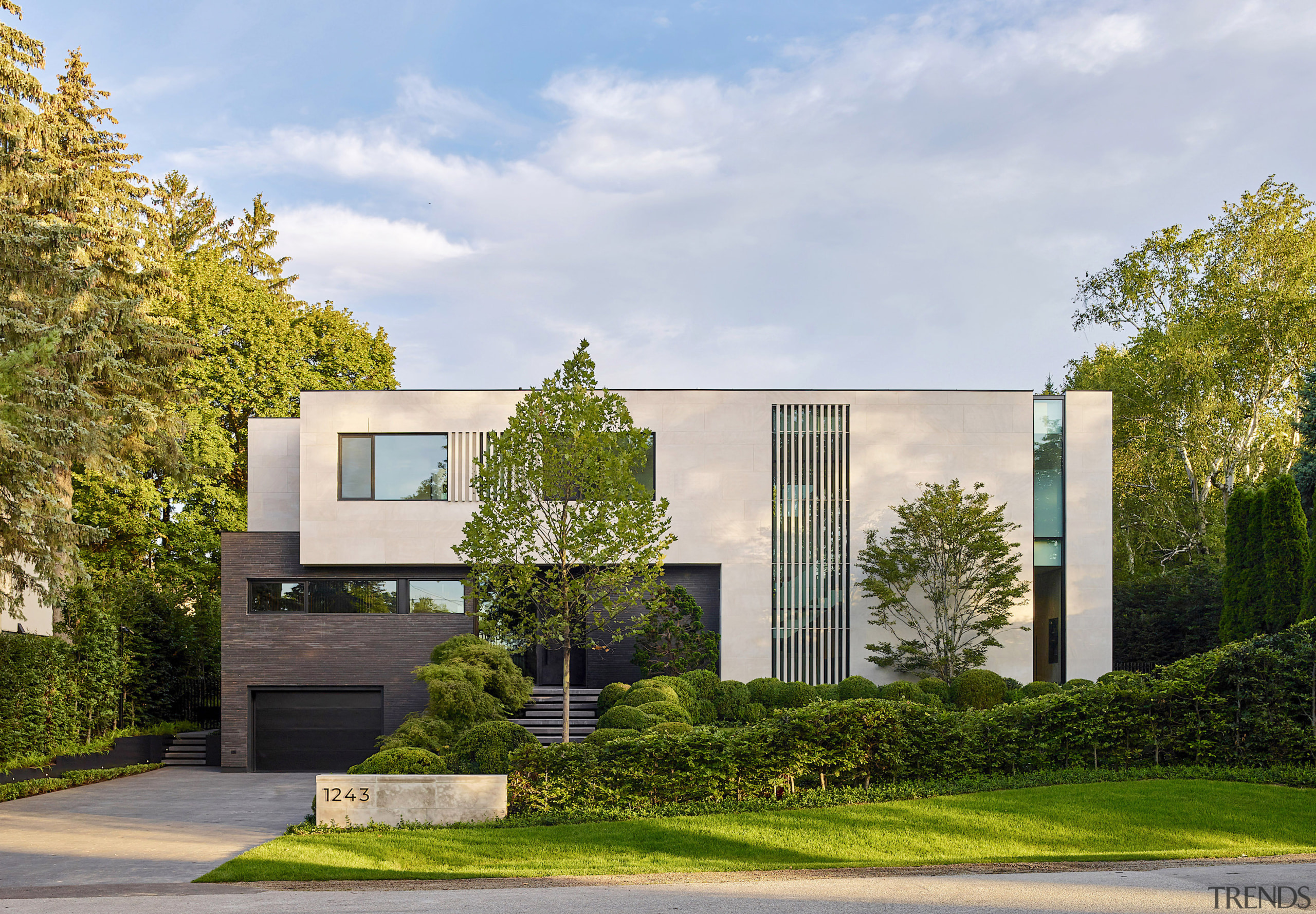 Street view of the nature-infused residence. 