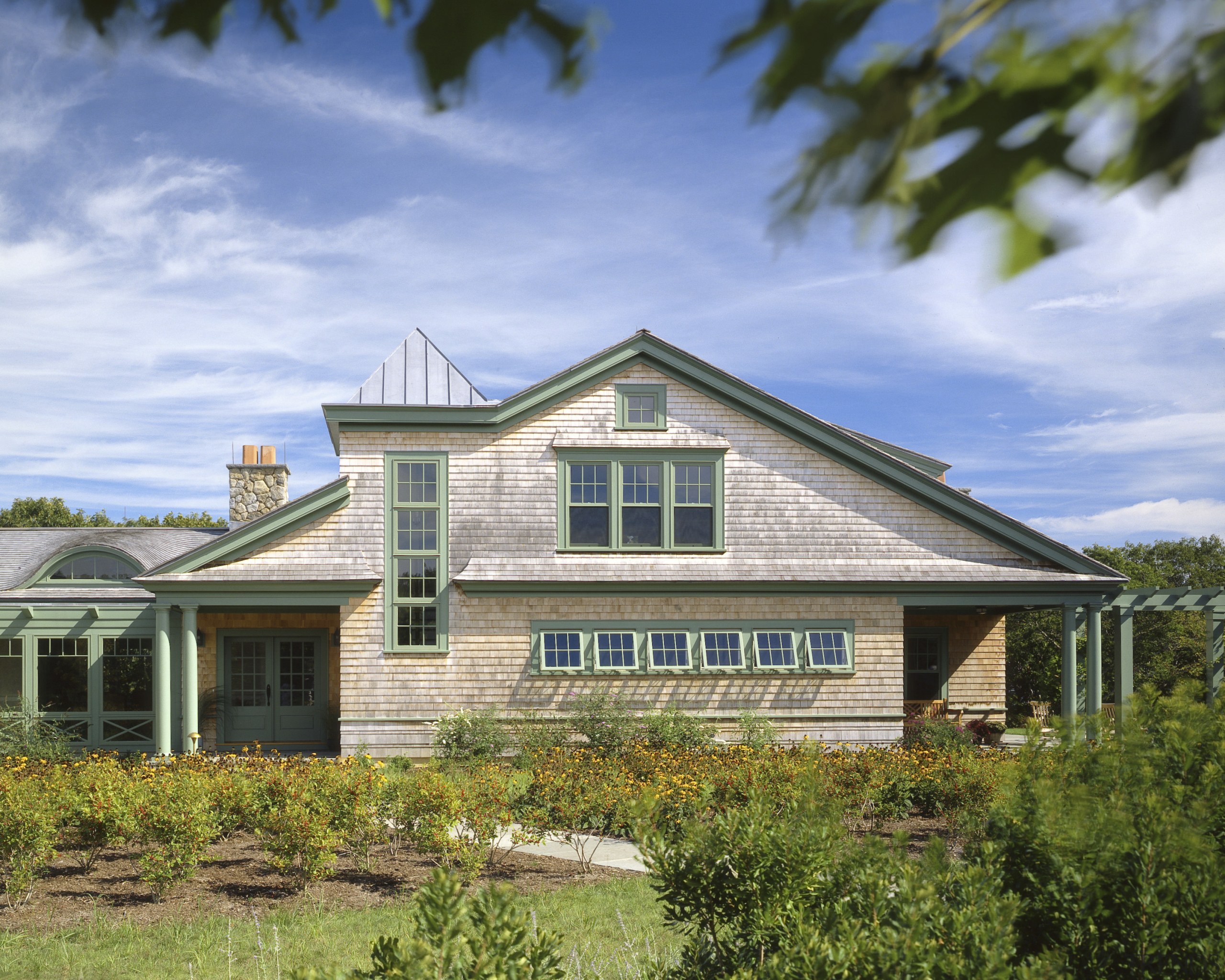 Exterior view of the house, shingle siding, shinlge cottage, elevation, estate, facade, farmhouse, home, house, land lot, landscape, property, real estate, residential area, roof, siding, sky, suburb, teal, brown