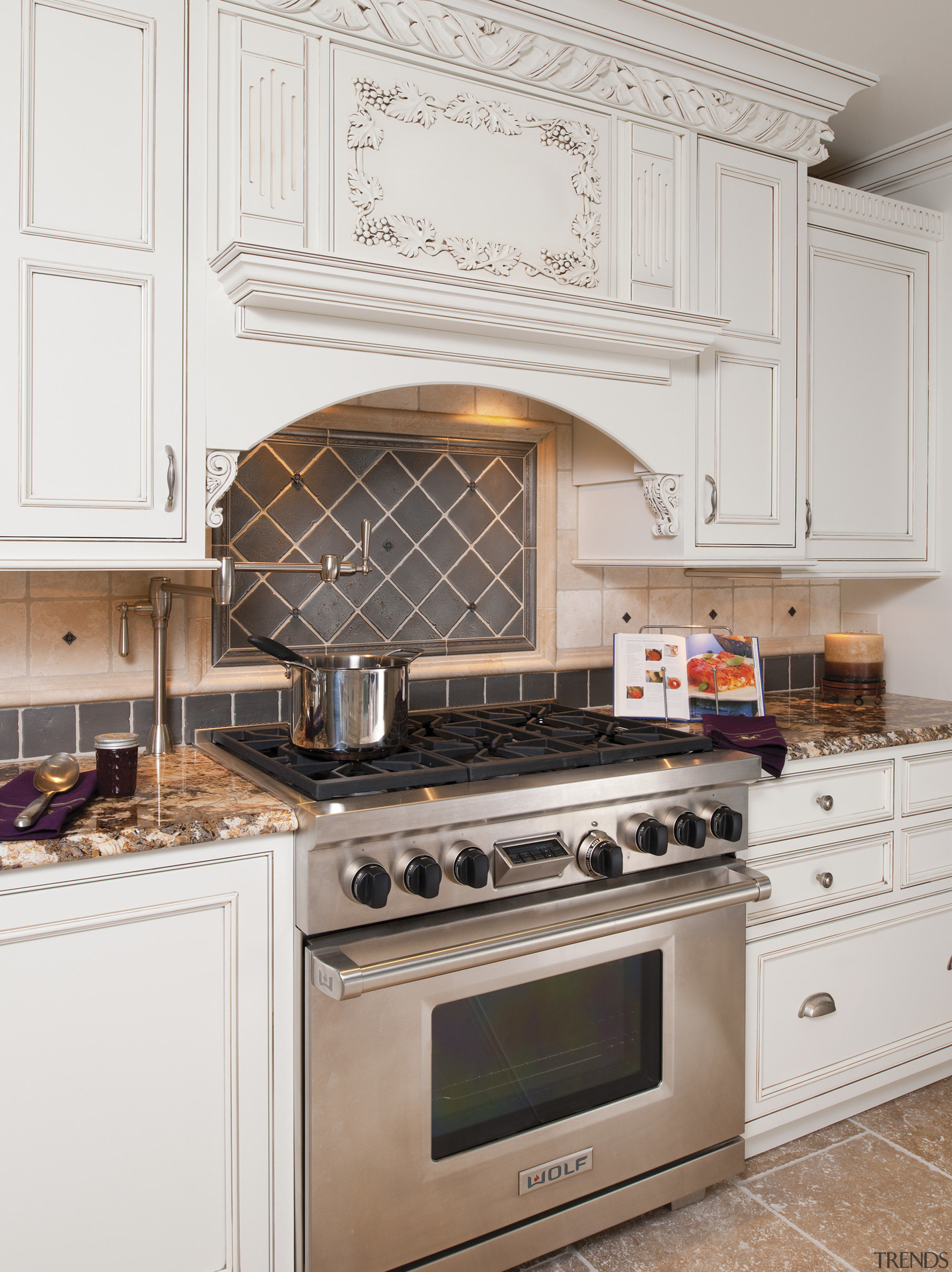 Traditional feel. Cabinetry and storage. Hand-crafted. cabinetry, countertop, cuisine classique, flooring, gas stove, home appliance, kitchen, kitchen appliance, kitchen stove, major appliance, oven, room, white