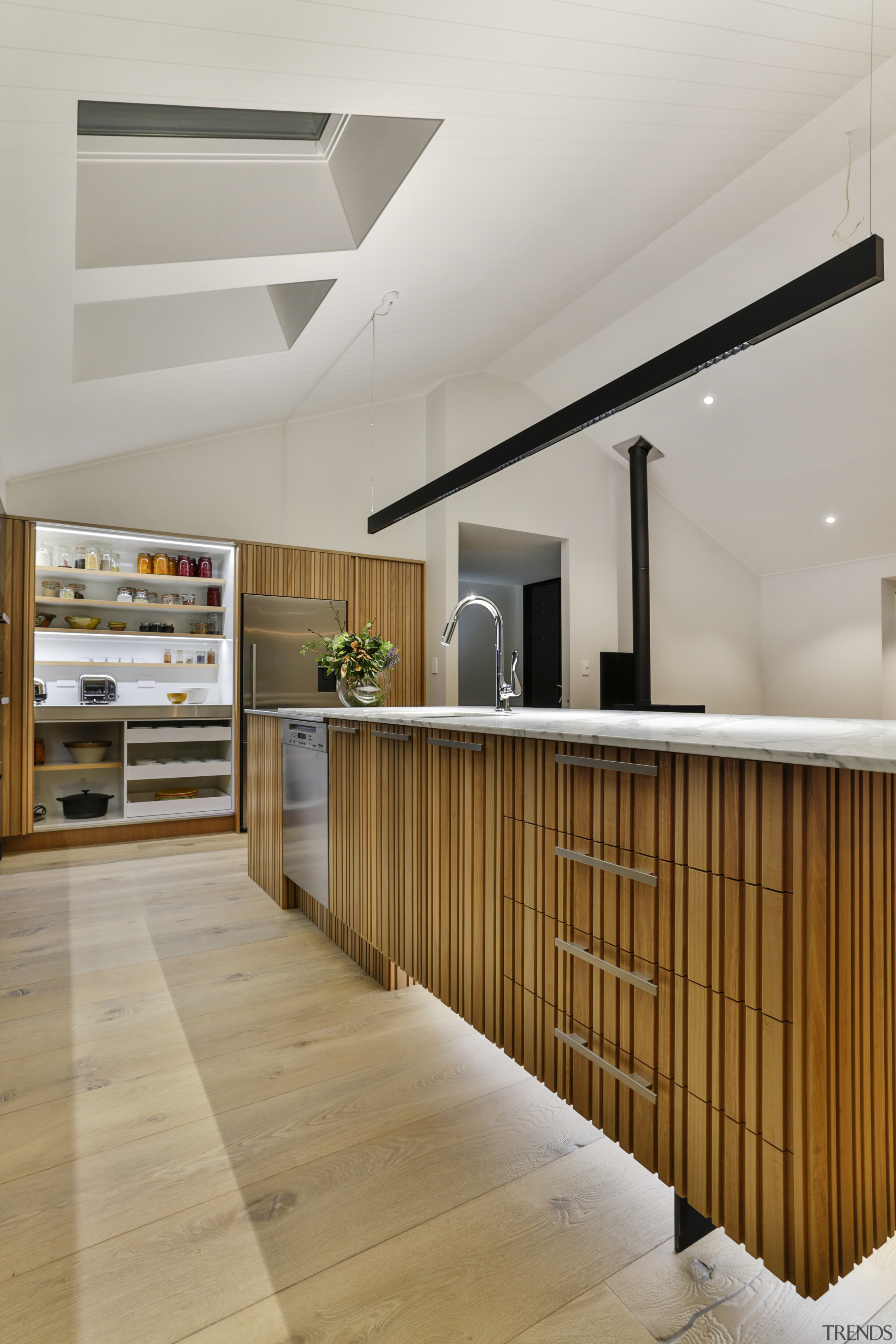 ​​​​​​​In this kitchen by designer Kira Gray, the gray, brown