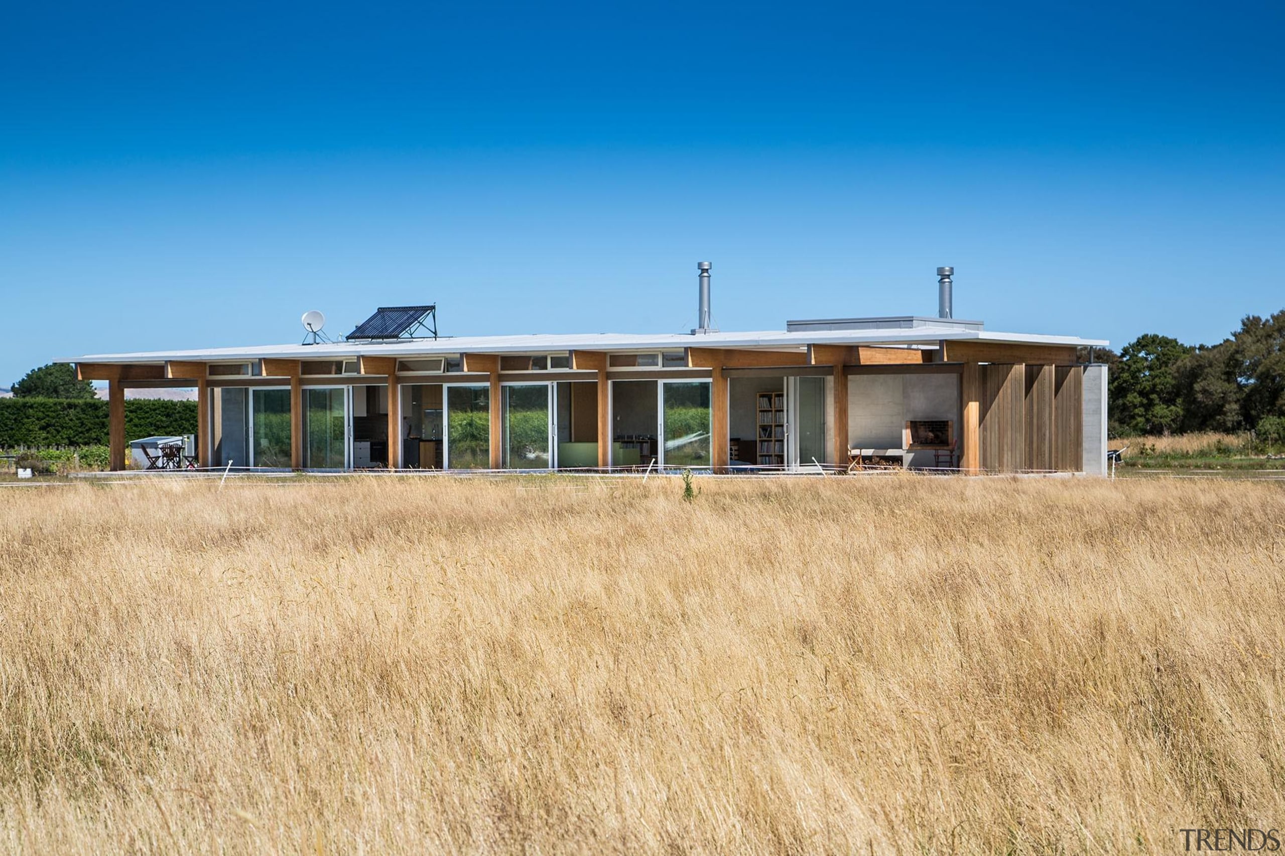 Wellington Architecture Awards cottage, farmhouse, field, home, house, land lot, landscape, prairie, property, real estate, sky, orange