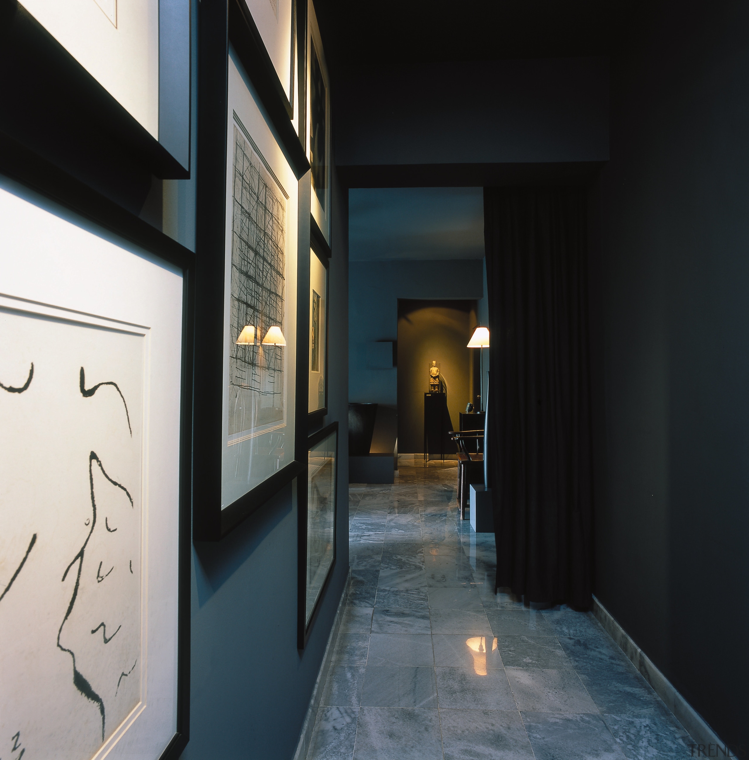 Hallway with large black and white prints, dark architecture, interior design, black
