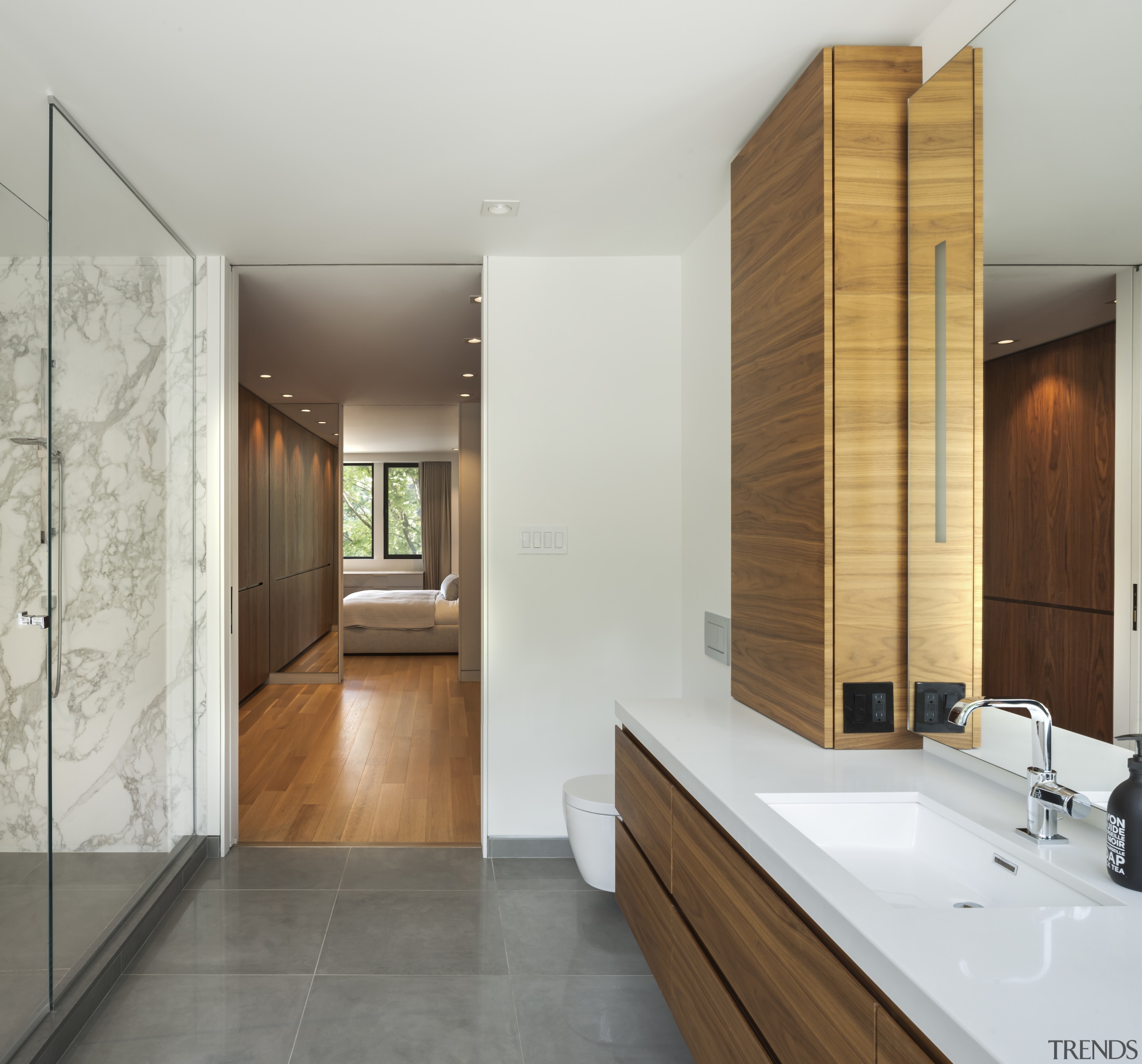 The opulent master suite includes a dressing room, 