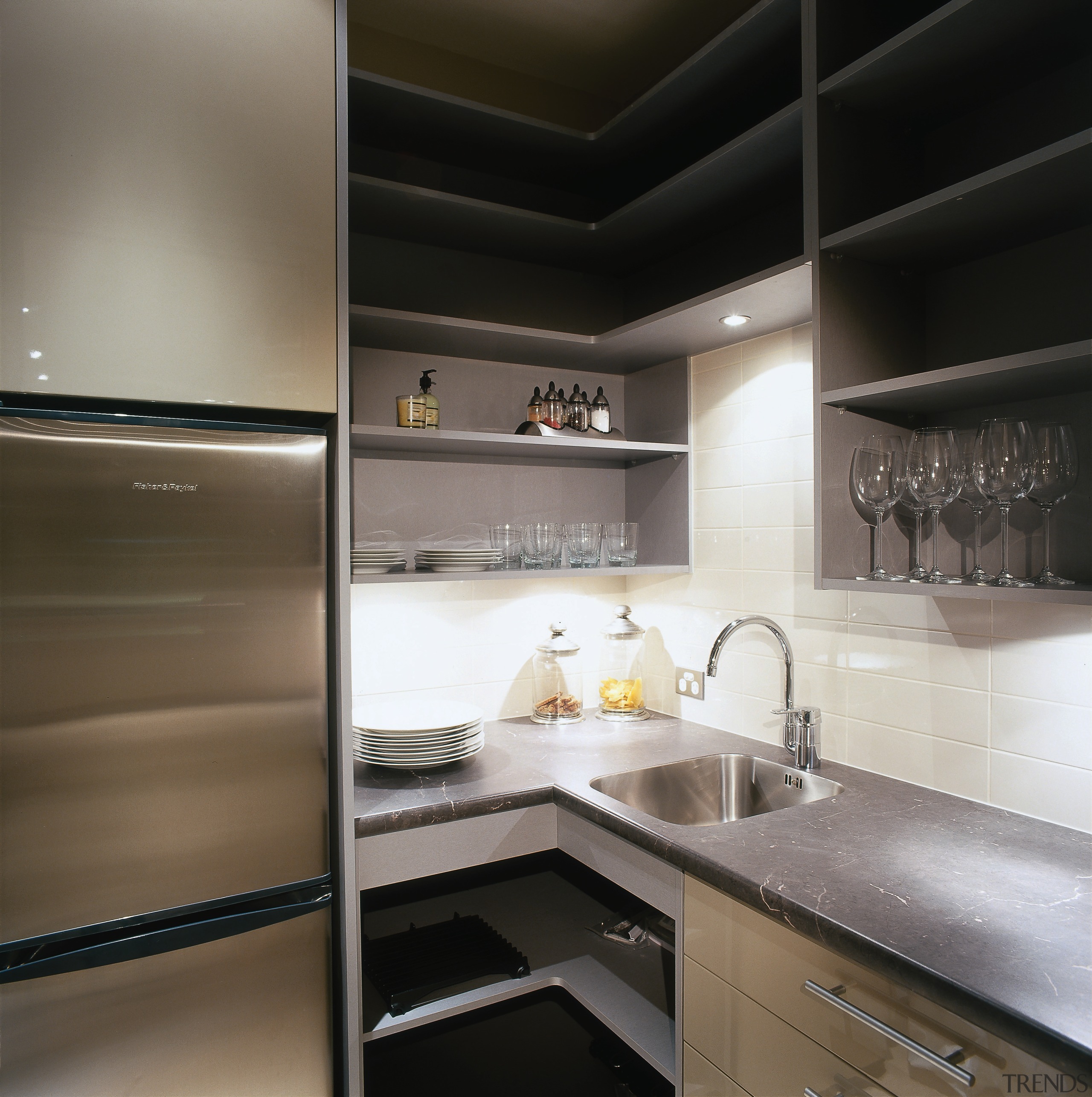 The detail of the pantry of a kitchen countertop, interior design, kitchen, under cabinet lighting, black, gray