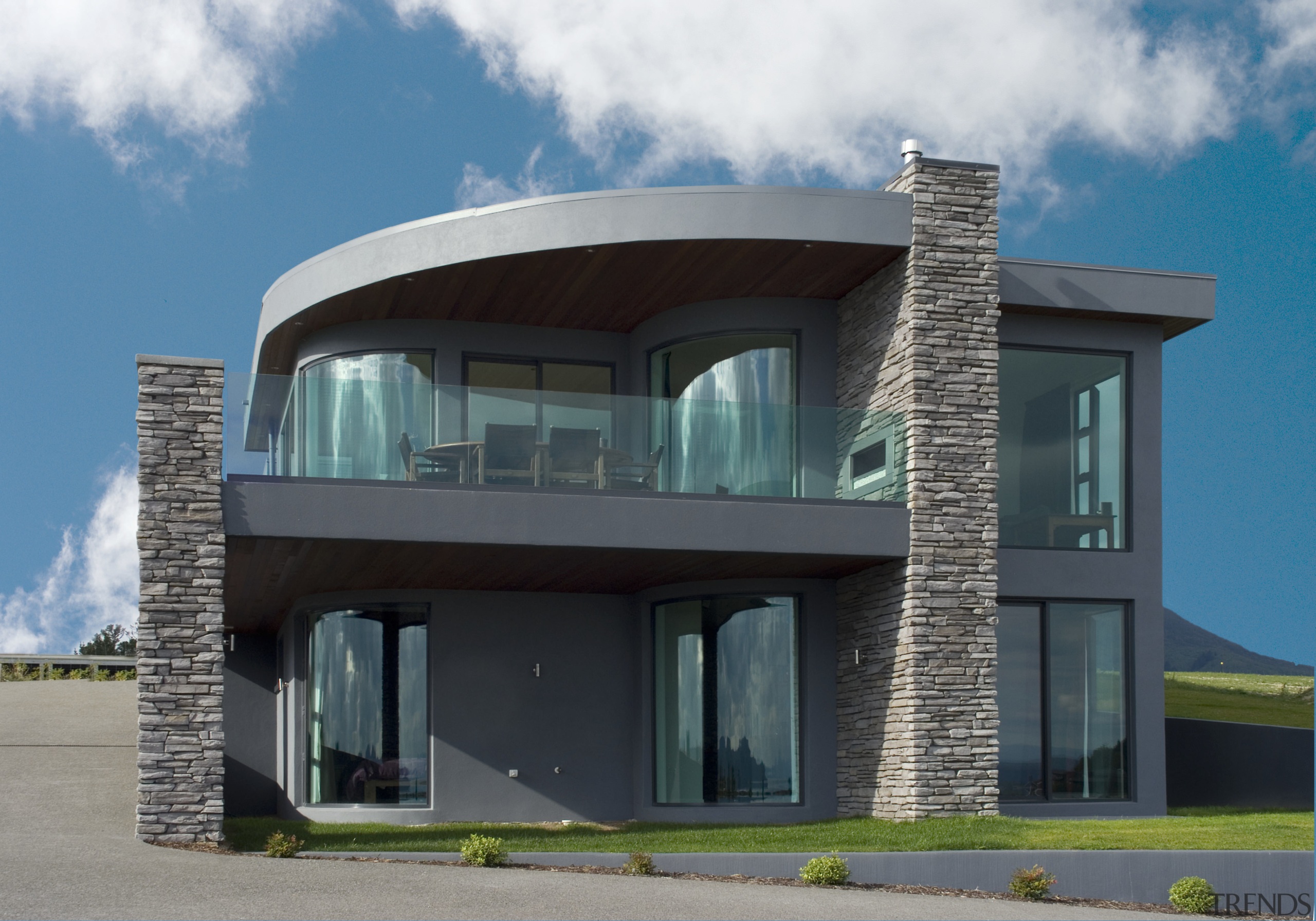 Aside from creating a dynamic facade for this architecture, building, commercial building, corporate headquarters, elevation, facade, home, house, property, real estate, residential area, sky, teal, black
