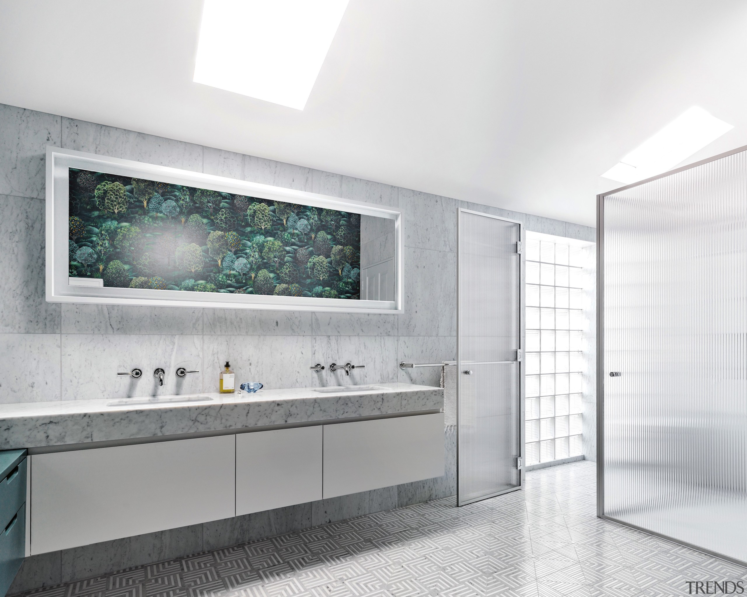 The serene palette used in the guest bathroom 