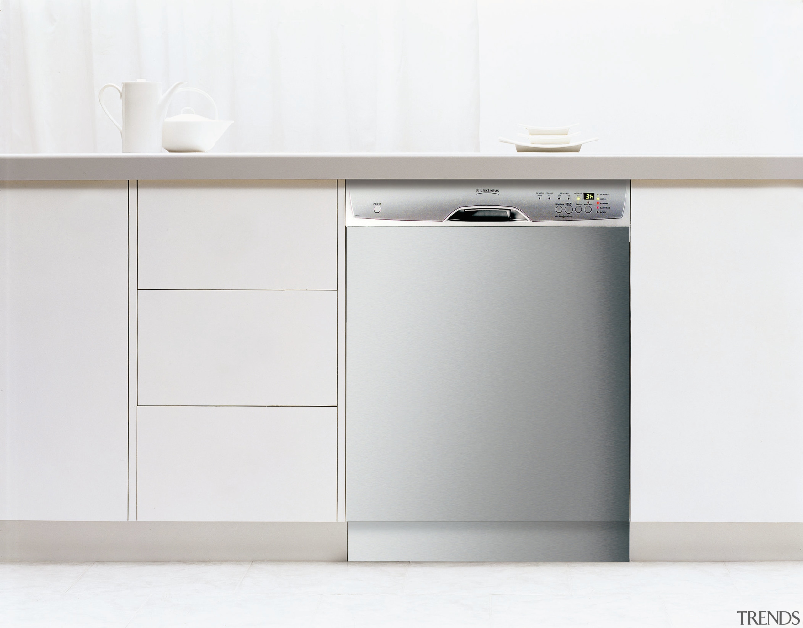 A view of a kitchen with white cabinetry, angle, furniture, home appliance, major appliance, product, product design, sideboard, white