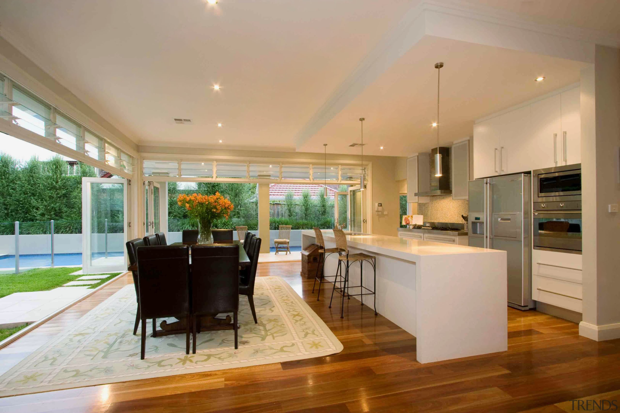 View of family home designed and built by ceiling, countertop, estate, floor, hardwood, interior design, kitchen, living room, real estate, brown, orange, gray