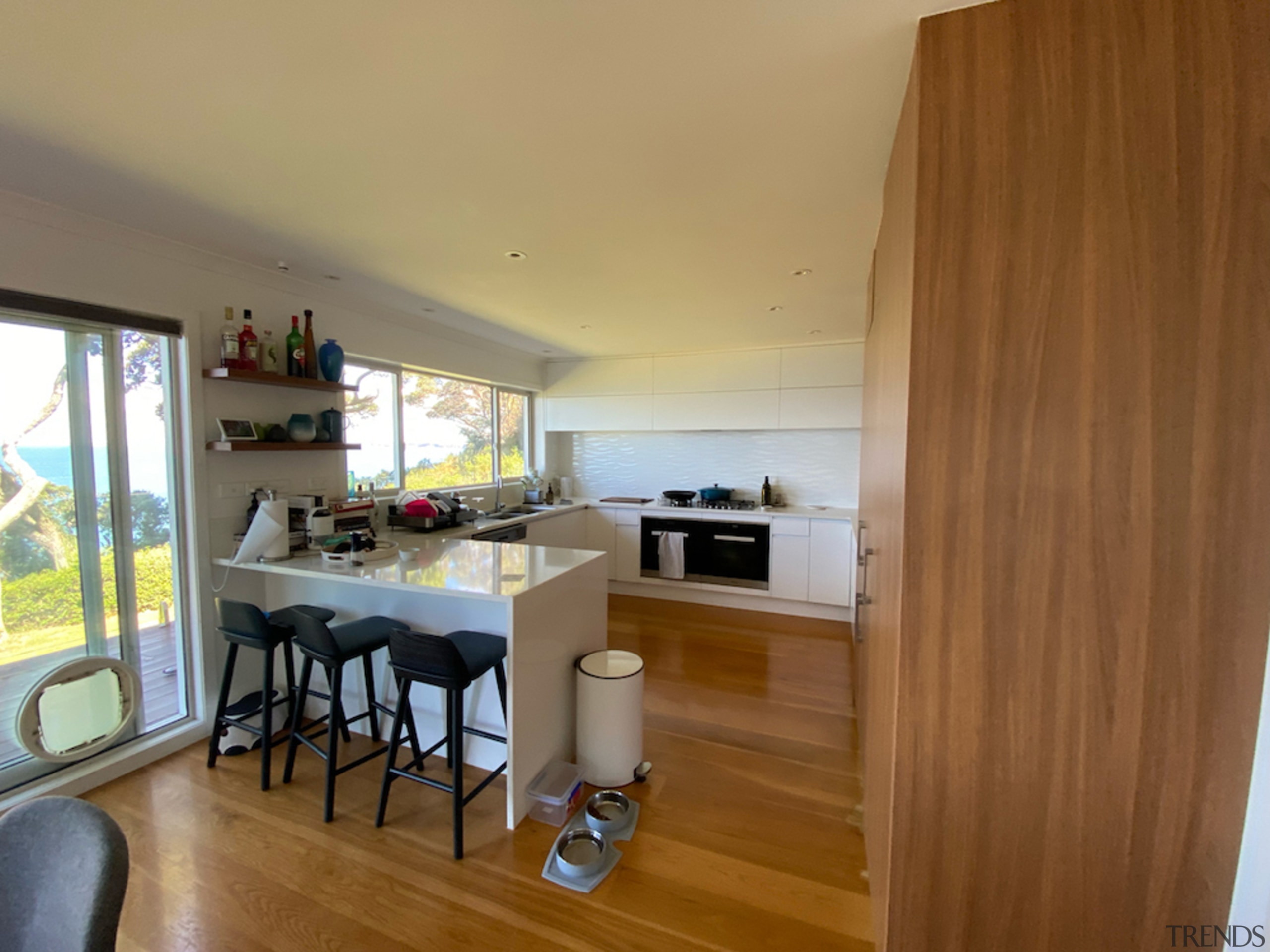 The small, semi-enclosed existing kitchen. - From awkward 