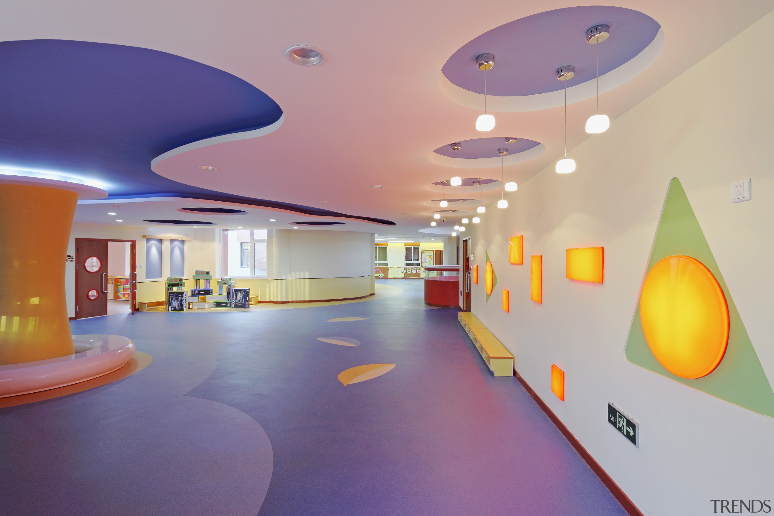 View of Dalian Preschool, with curvilinear forms and ceiling, daylighting, floor, institution, interior design, leisure centre, gray