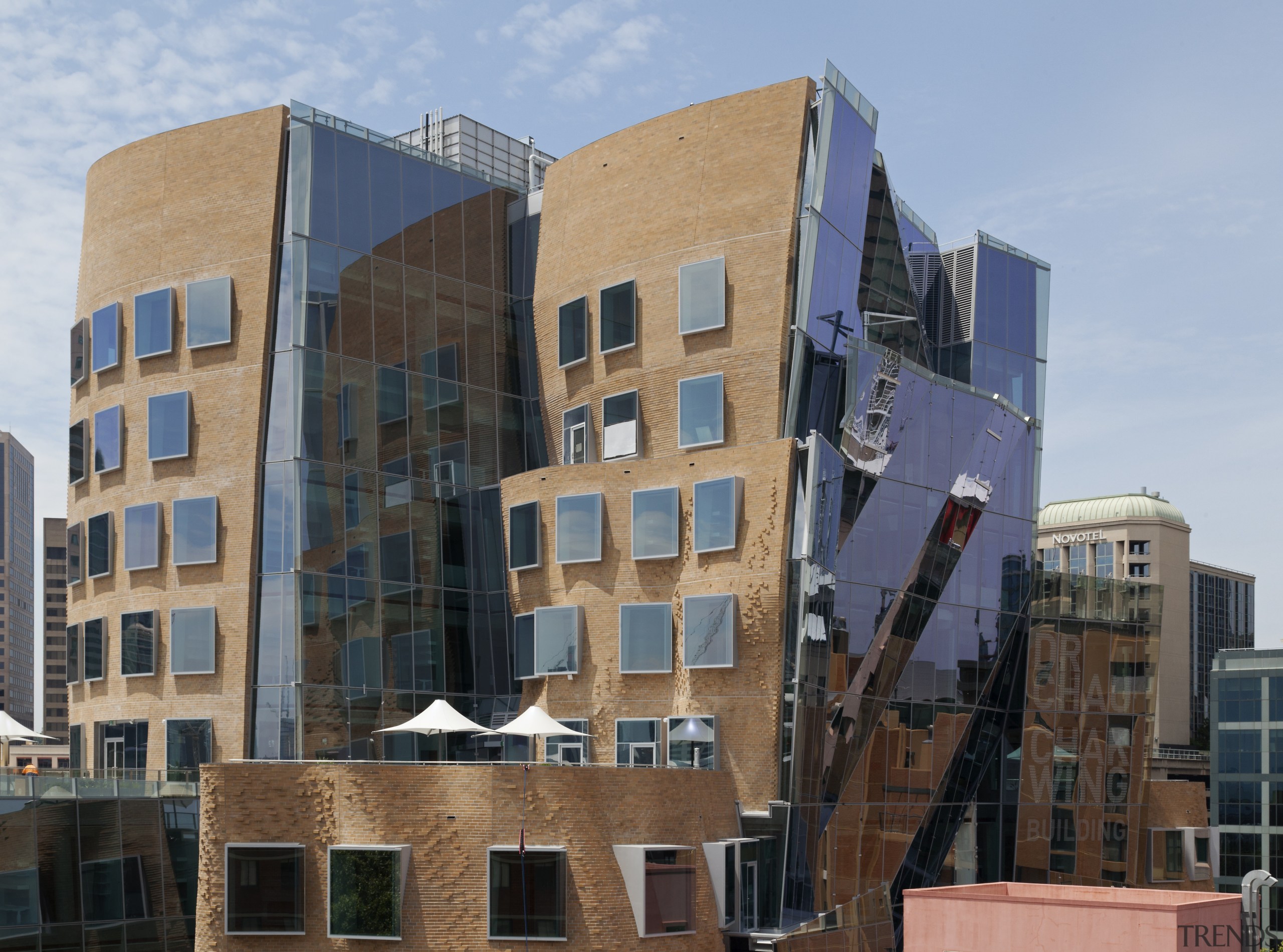 The multifaceted facade and pop-out windows of the apartment, architecture, building, city, commercial building, condominium, facade, house, metropolis, mixed use, neighbourhood, real estate, residential area, sky, tower block, window