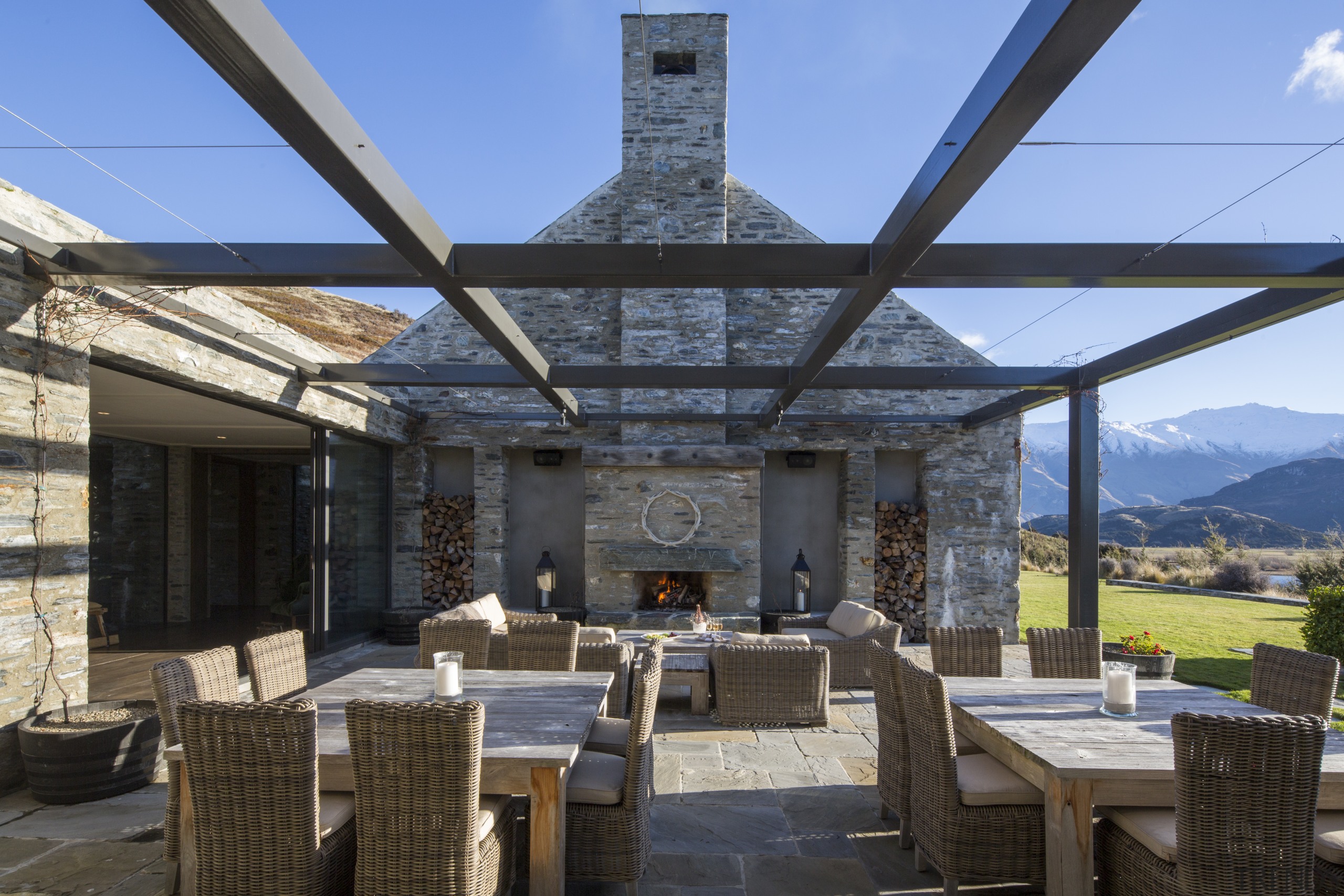 Piwakawaka Point villa, Wanaka, New Zealand - architecture architecture, beam, building, estate, furniture, home, house, interior design, patio, pergola, porch, property, real estate, restaurant, roof, room, shade, sky, table, black, teal