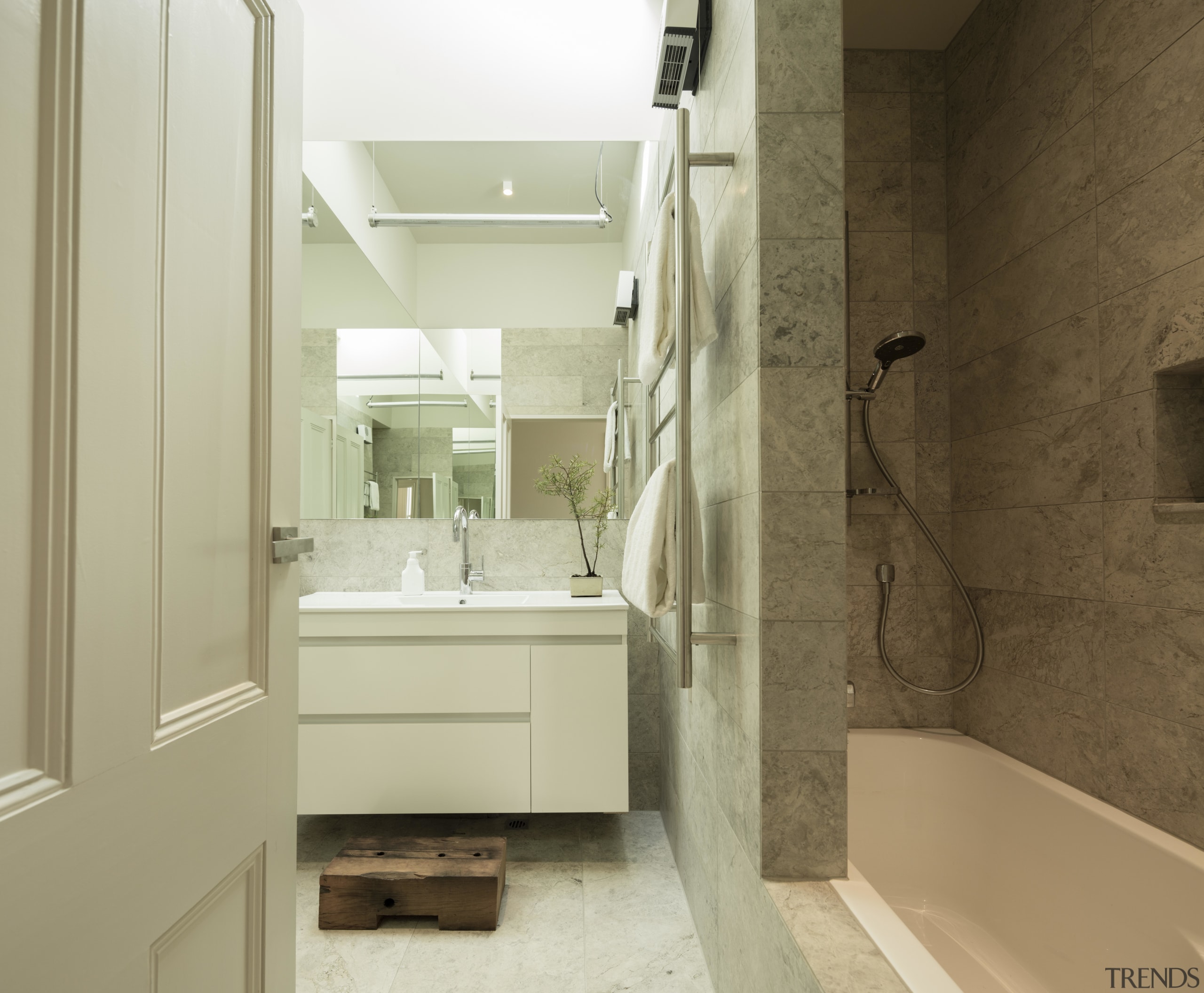 While traditional detailing was generally retained in this bathroom, bathroom accessory, bathroom cabinet, floor, home, interior design, room, sink, brown, yellow