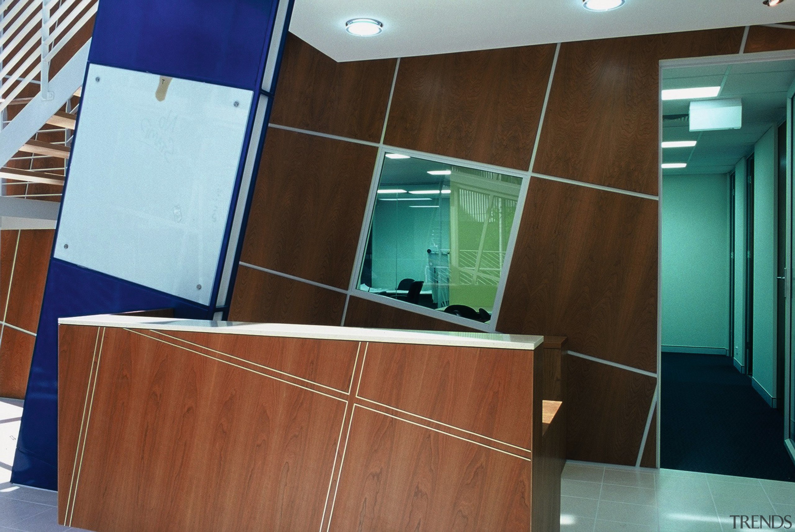 view of the reception area  with a floor, flooring, furniture, glass, interior design, brown