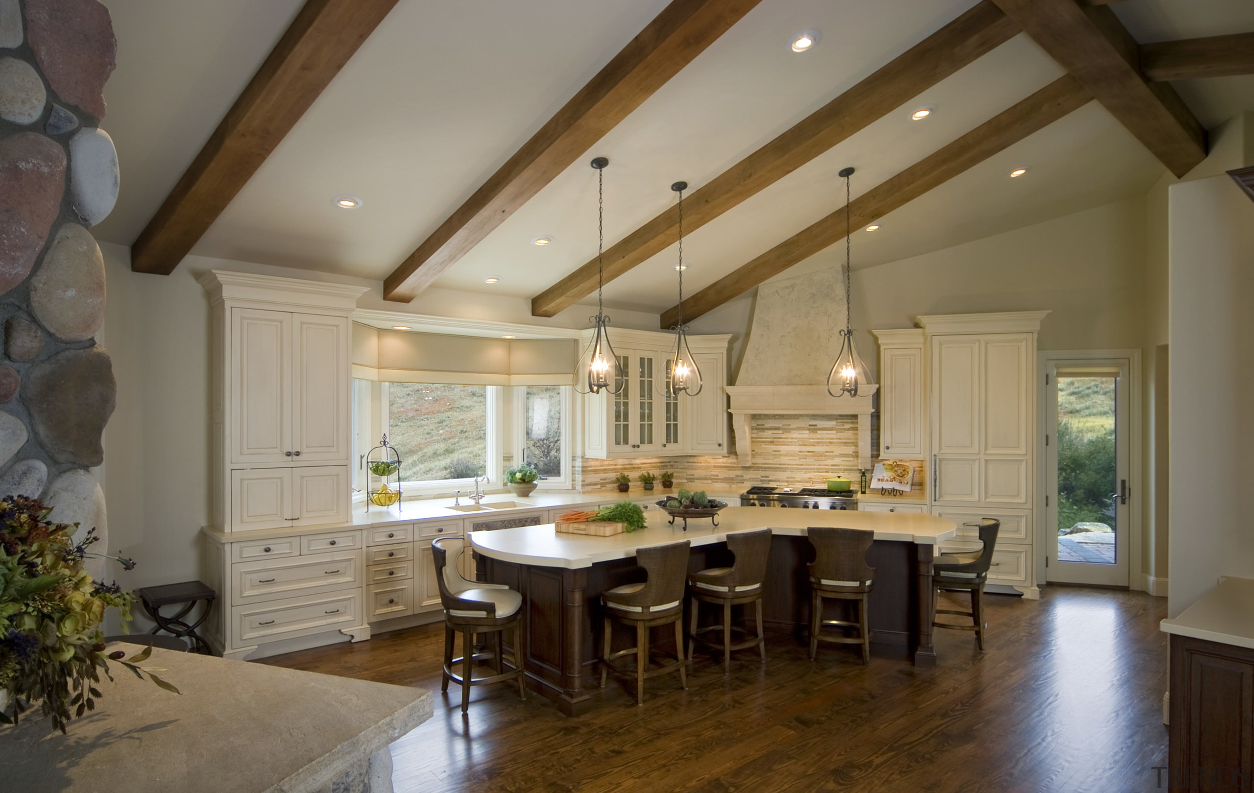 Kitchen Distributors has the design expertise and skilled beam, cabinetry, ceiling, countertop, cuisine classique, daylighting, dining room, estate, floor, flooring, hardwood, home, interior design, kitchen, living room, real estate, room, window, wood flooring, brown