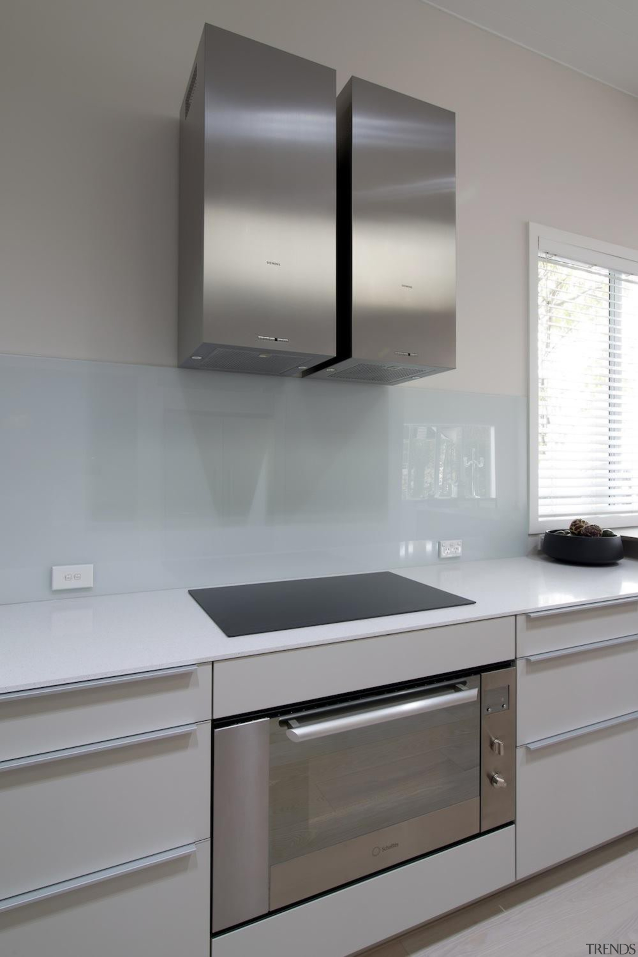 Lavish modern oven is accompanied by double extractor cabinetry, countertop, home appliance, interior design, kitchen, kitchen appliance, kitchen stove, major appliance, product design, sink, gray