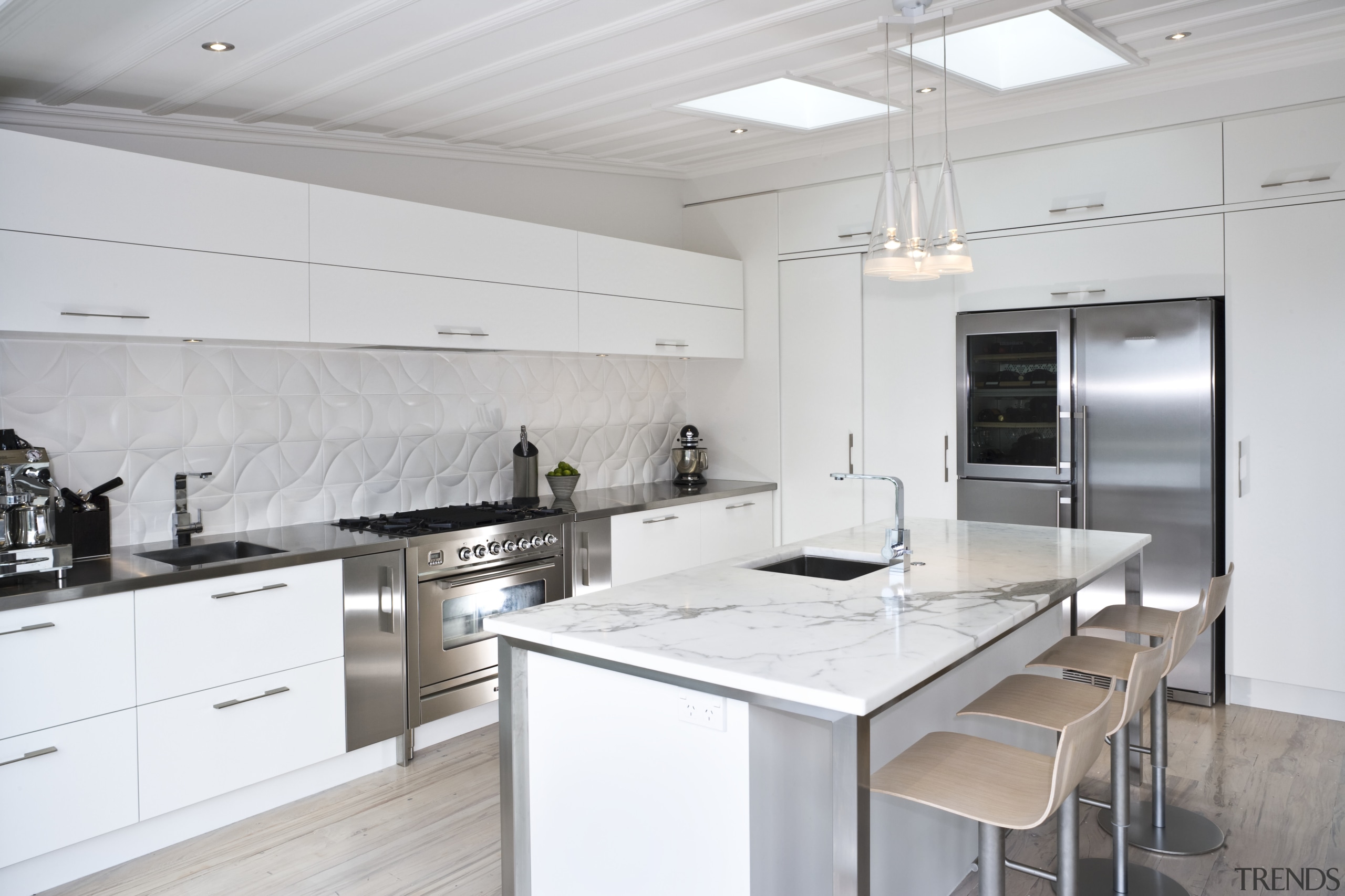 View of the kitchen and dining room where countertop, cuisine classique, interior design, kitchen, real estate, white, gray