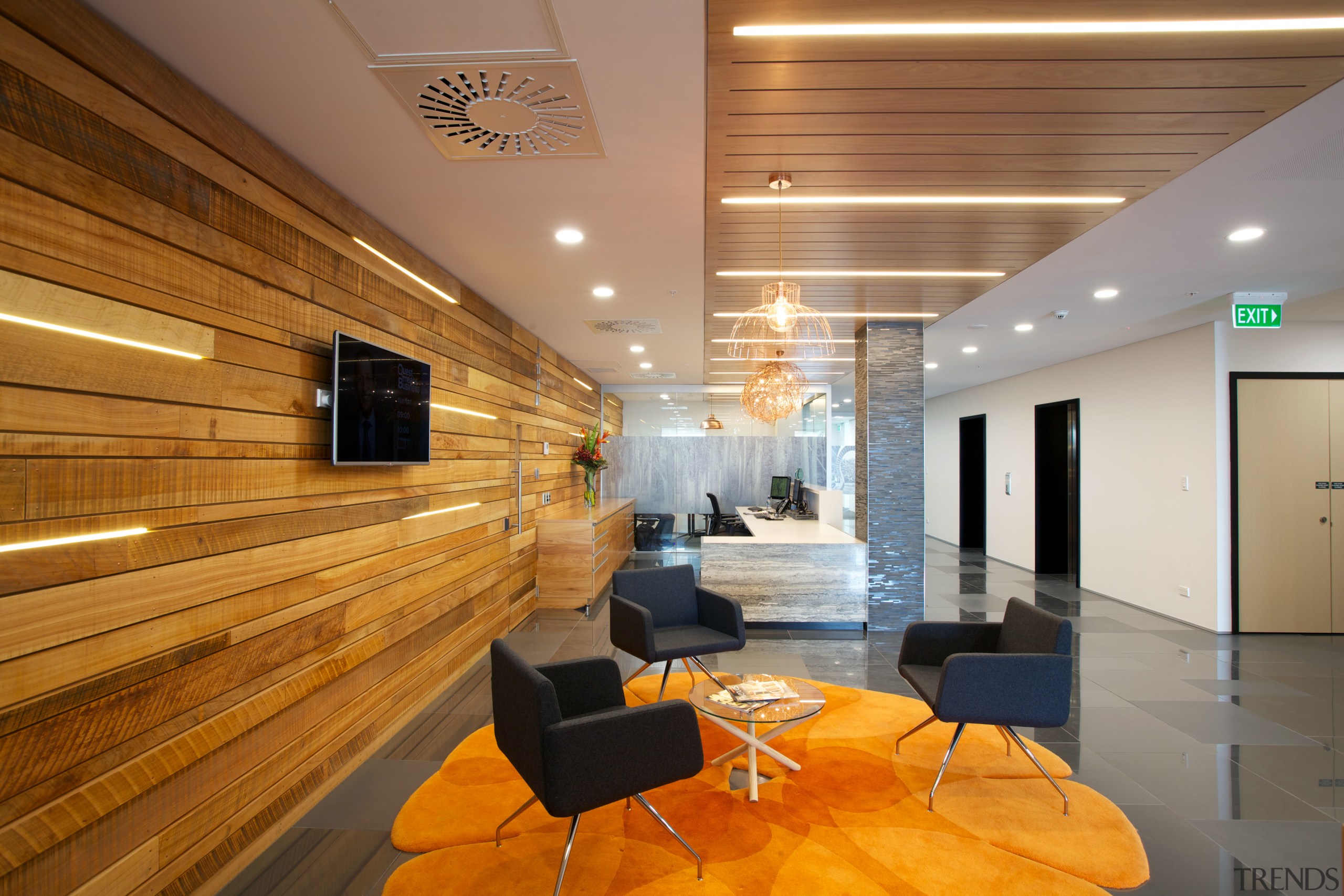 Lighting strips enhance the warm glow of the ceiling, floor, flooring, interior design, lobby, brown, orange