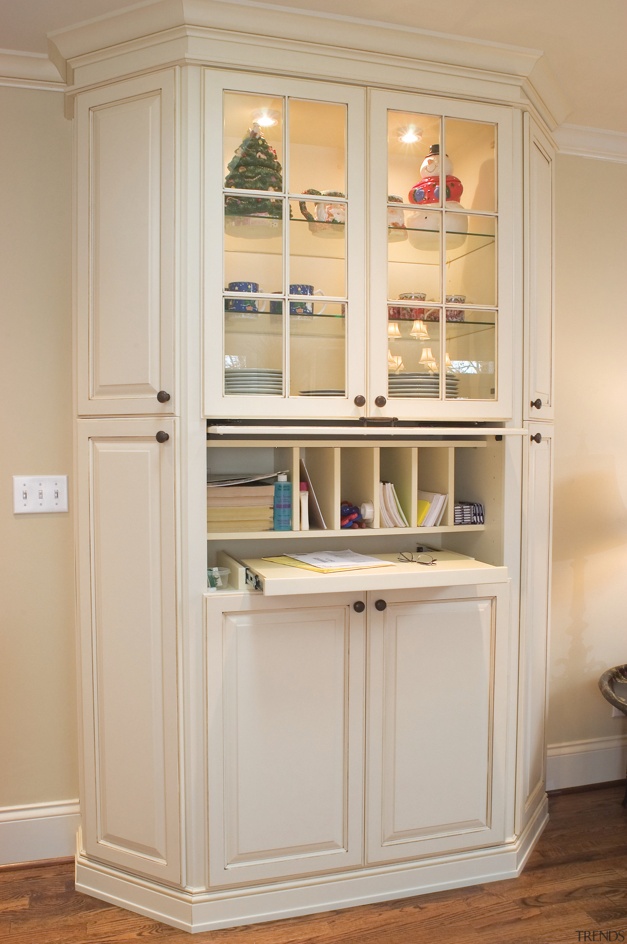 A view of s kitchen remodelled by Design bookcase, cabinetry, chest of drawers, closet, cupboard, display case, furniture, shelf, shelving, gray, orange