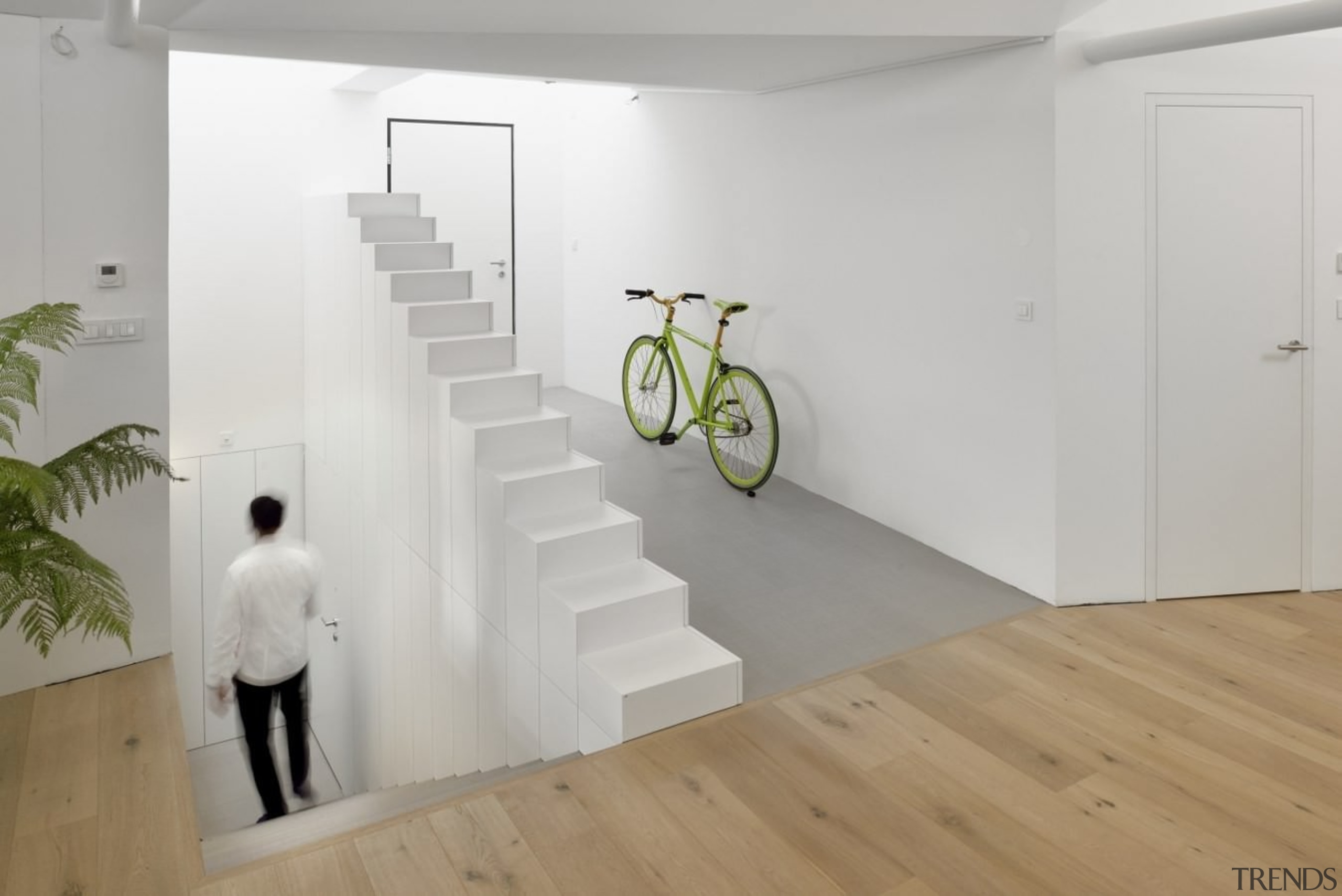 This stairway runs counter to a potential shelf floor, flooring, house, interior design, laminate flooring, product design, wall, wood, wood flooring, gray